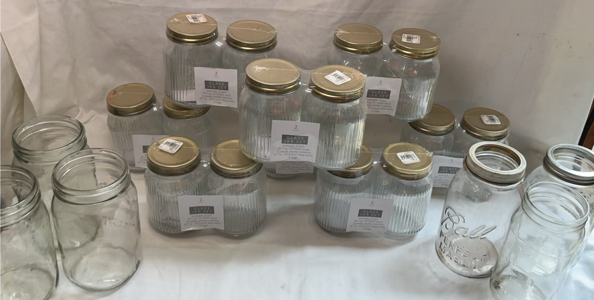 Glass jars with metal lids, most NEW - image 1 of 4