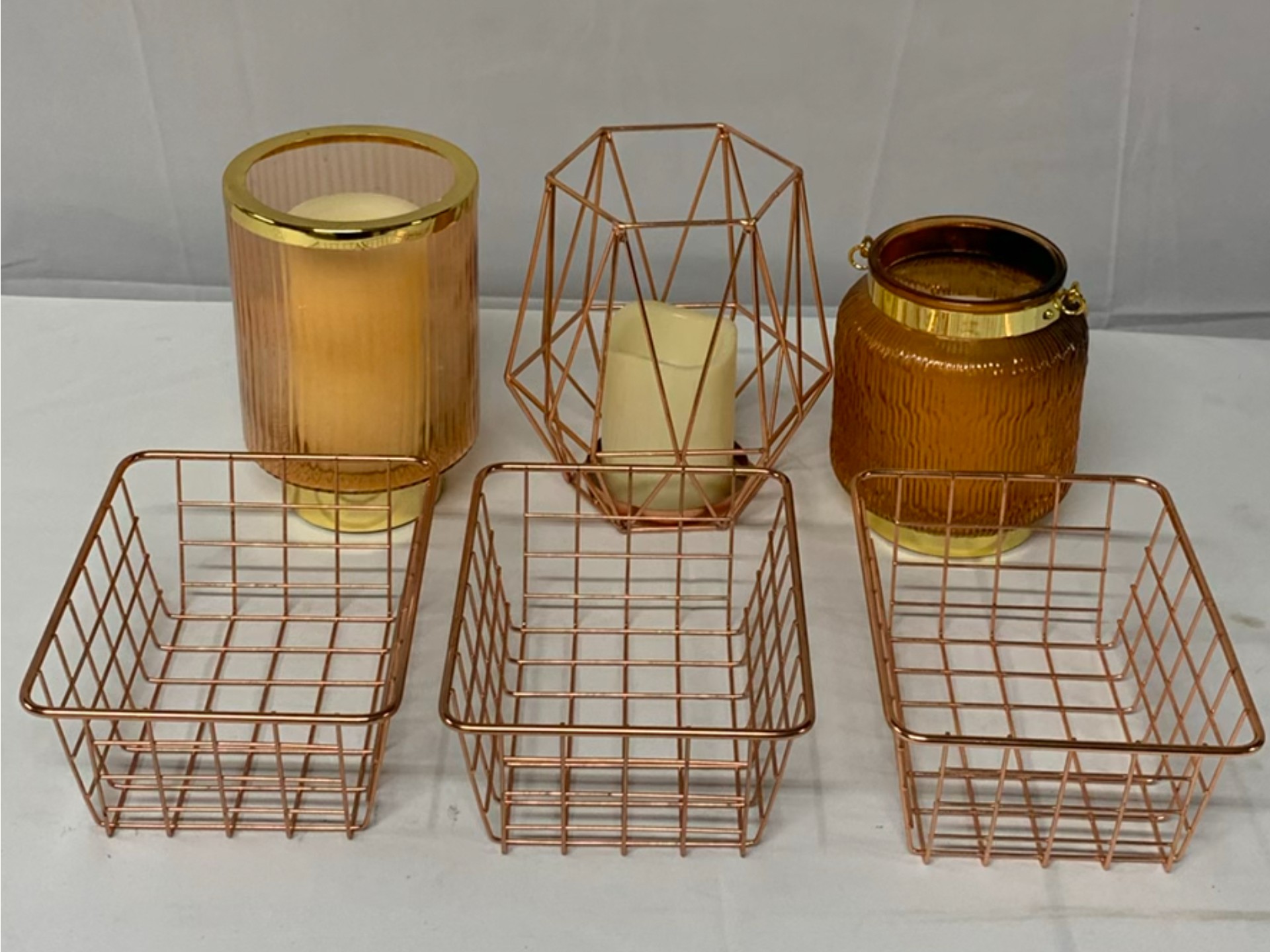 Copper Toned Baskets And Candle Holders - image 1 of 4