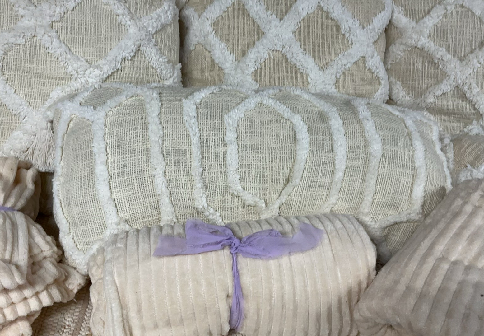 Beige decorative pillows and matching throws - image 3 of 6