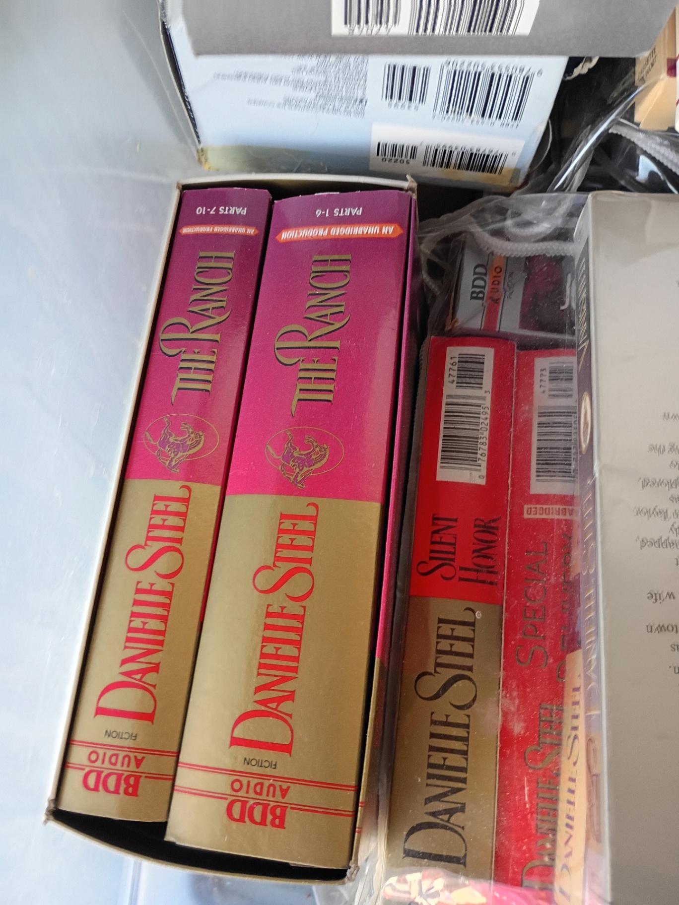 Collection of Audiobook Cassette Tapes in Storage Bins - image 7 of 8