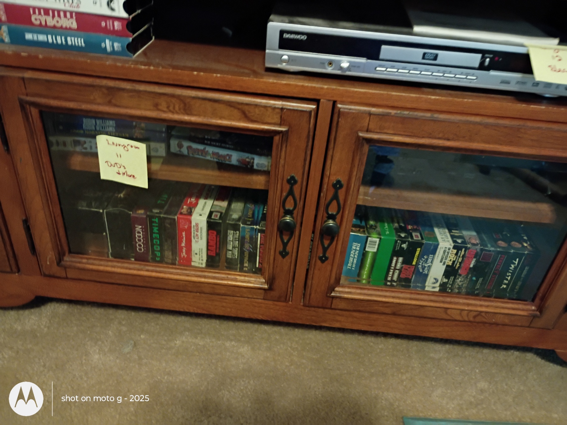 Assorted VHS Tapes, DVDs, and Media Storage Cabinet - image 2 of 8