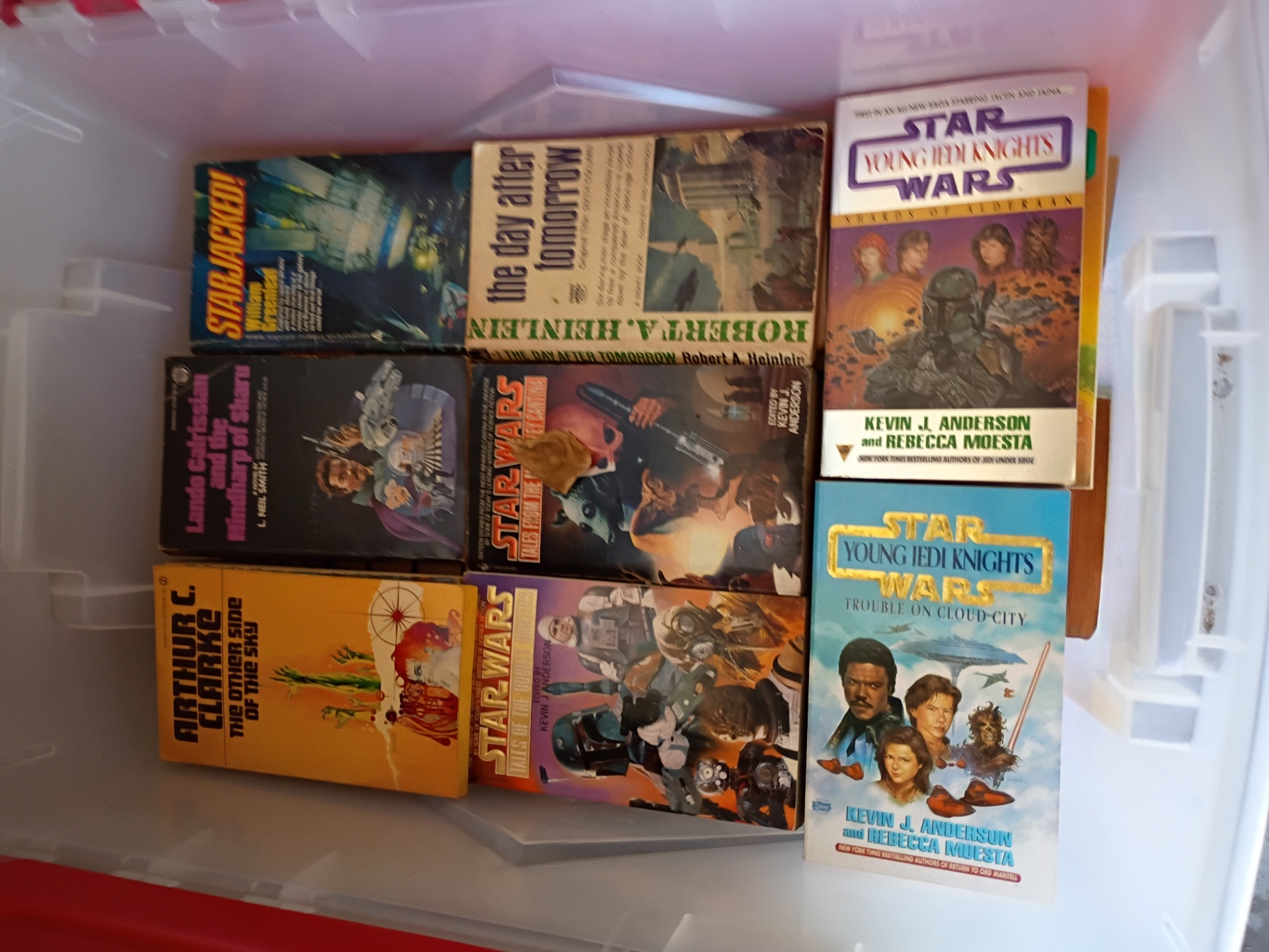 Collection of Science Fiction Paperback Books in Plastic Storage Bin - image 3 of 4