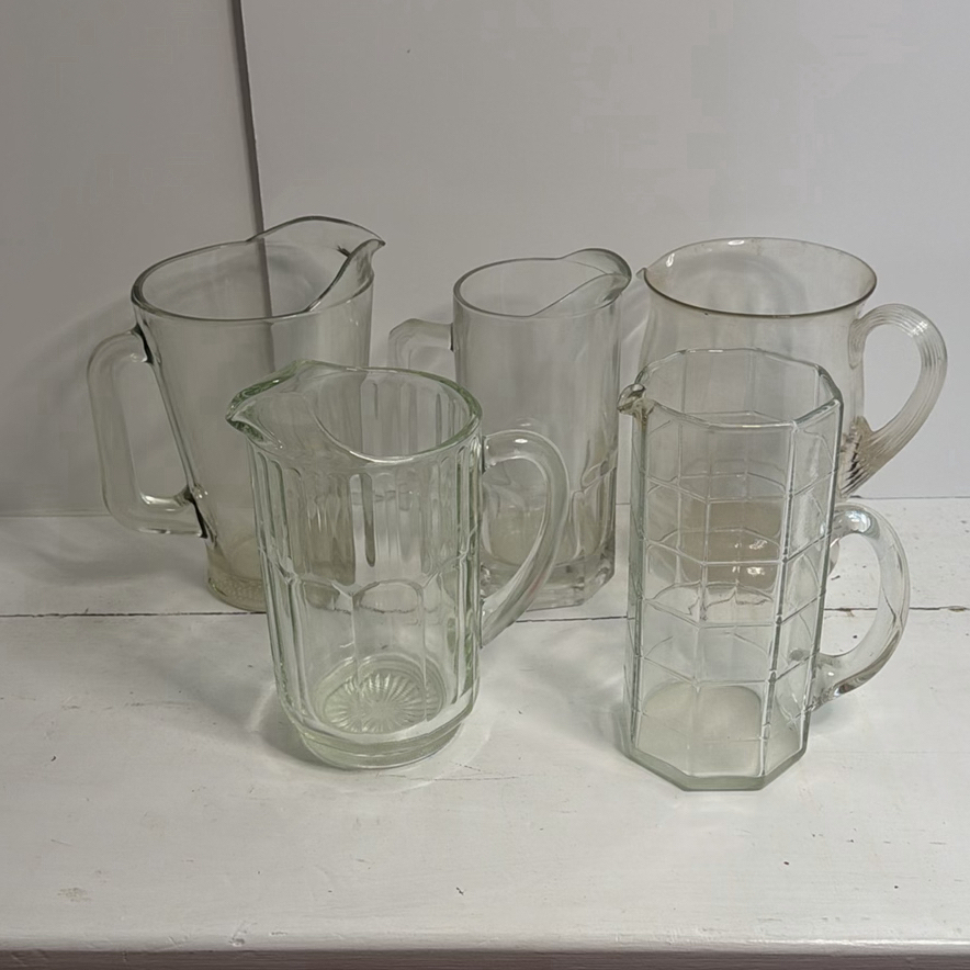 Assorted Clear Glass Vintage Pitchers - image 1 of 6