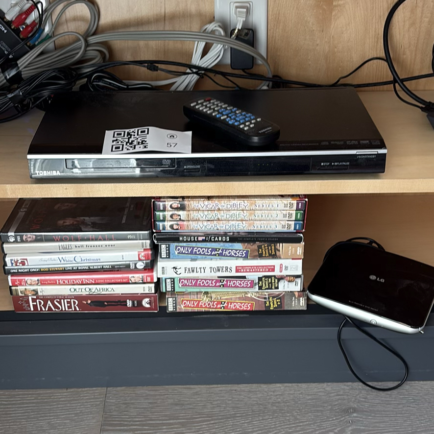 Toshiba DVD Player and Assorted DVD Box Sets - image 1 of 10