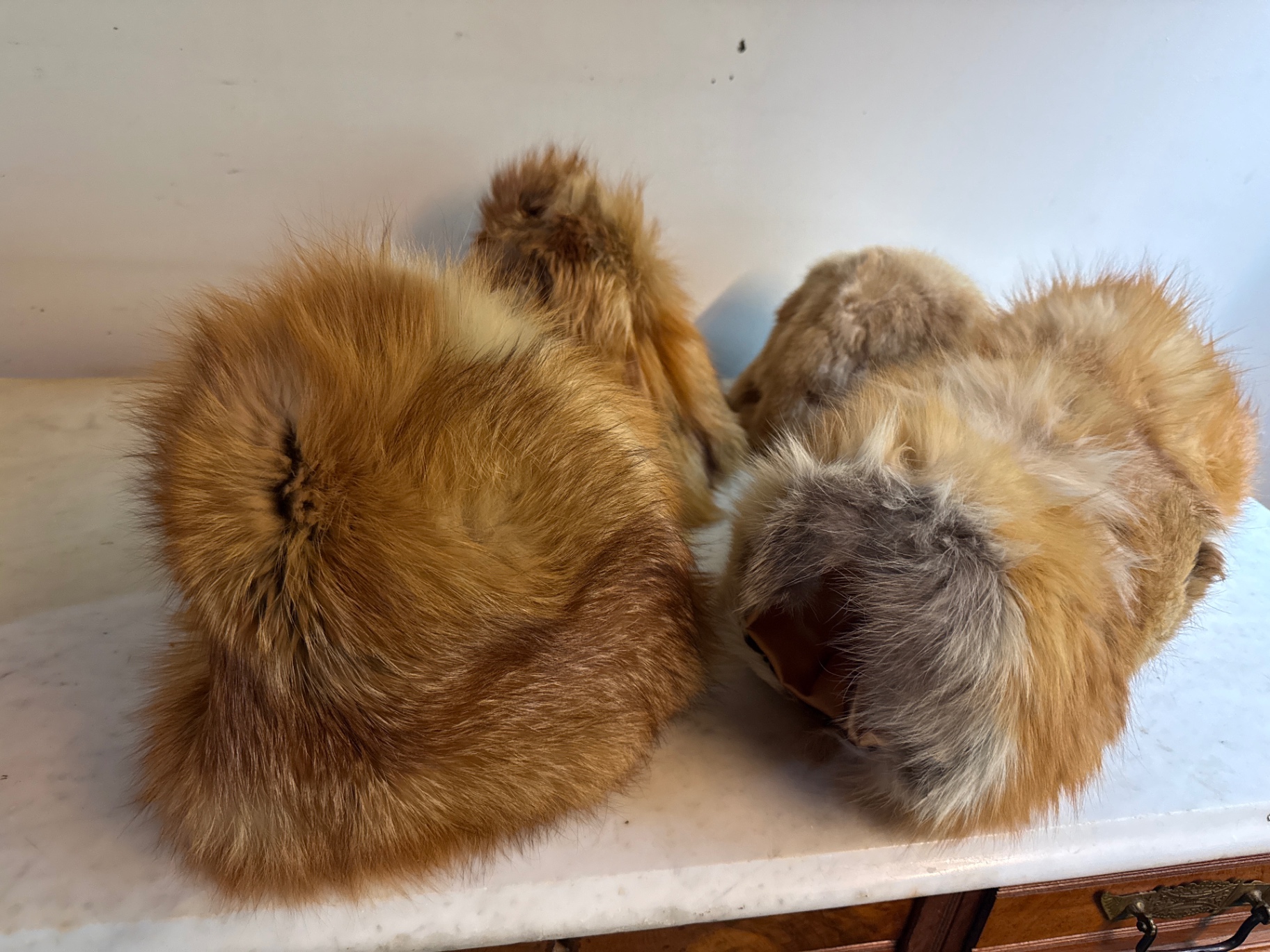 Assorted fluffy fur hats - image 1 of 3