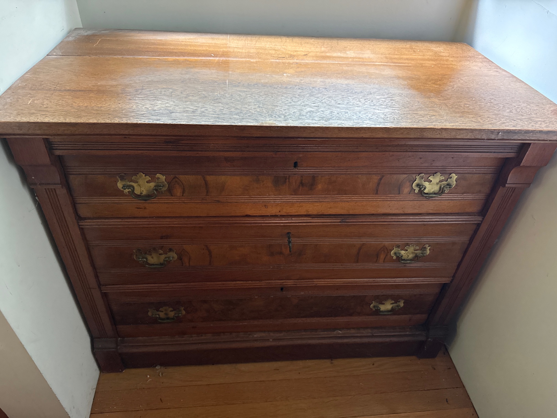 Four-drawer wooden dresser - image 1 of 3