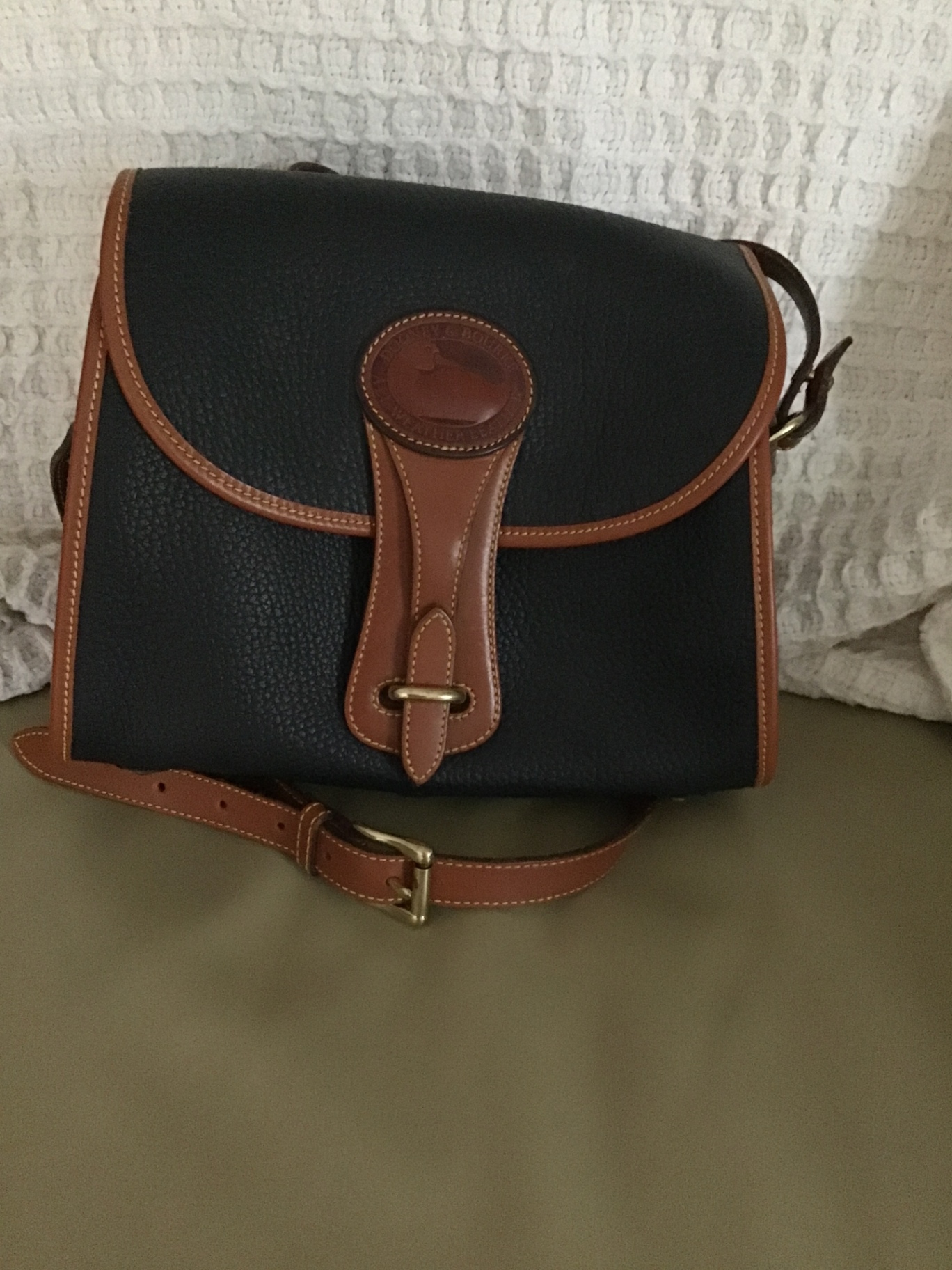 Navy blue Dooney and Bourke Leather  Bag with Brown Trim - image 1 of 2
