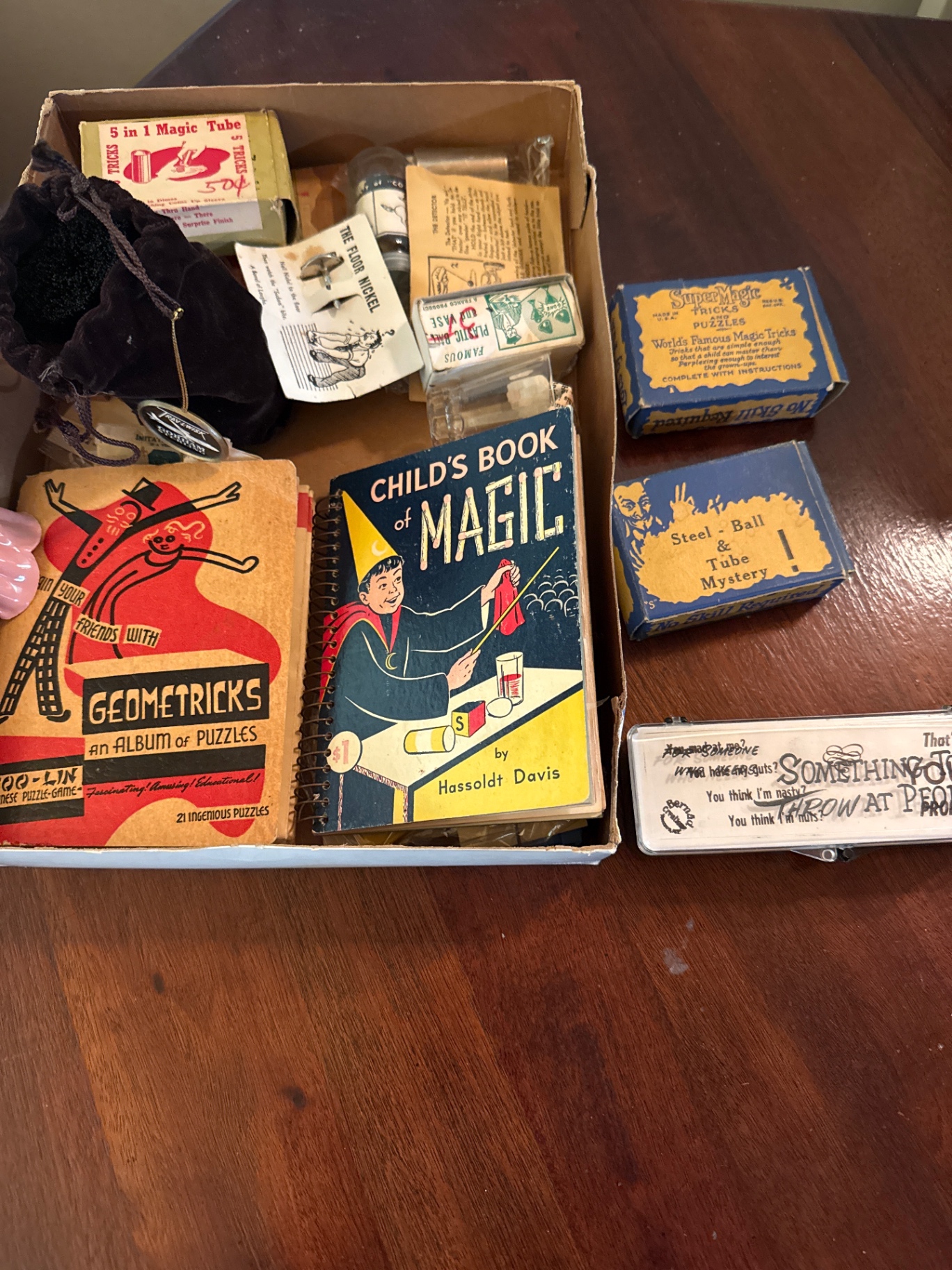 Vintage Magic Tricks and Puzzle Books - image 1 of 2