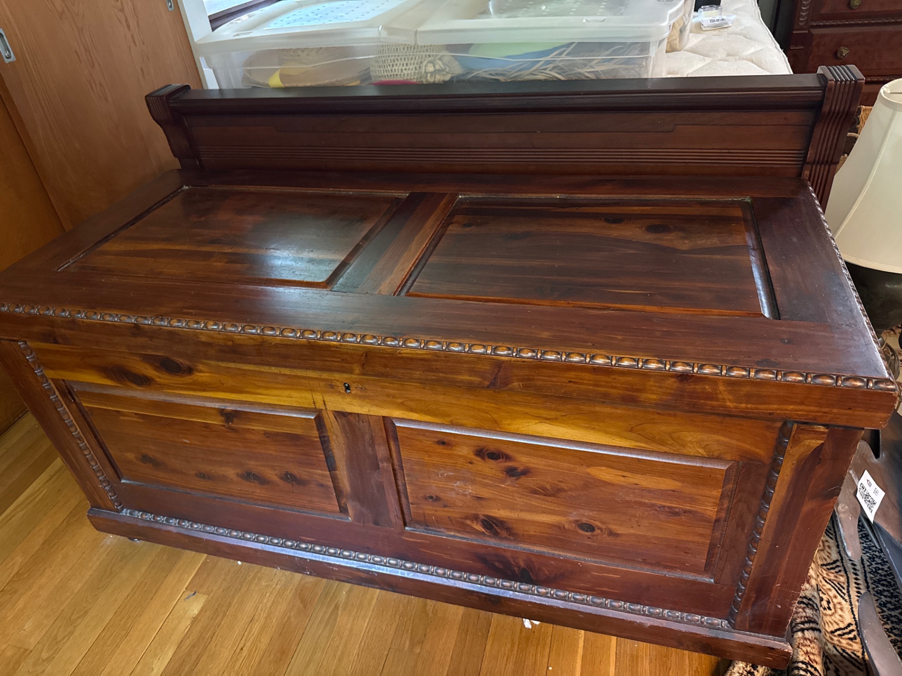 Antique wooden chest with carved trim - image 1 of 2