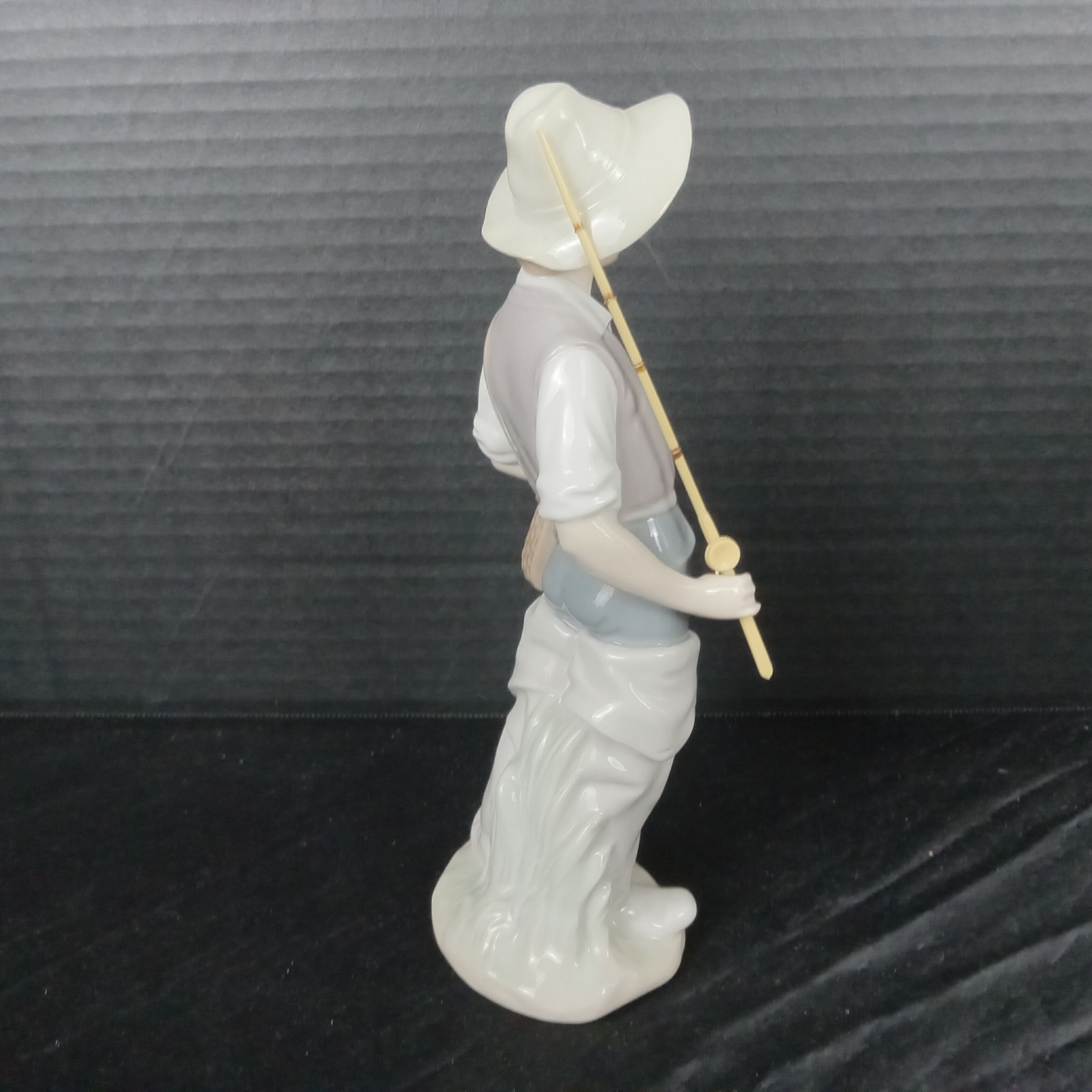 Lladro Boy w/Fishing Pole Figurine - image 2 of 6