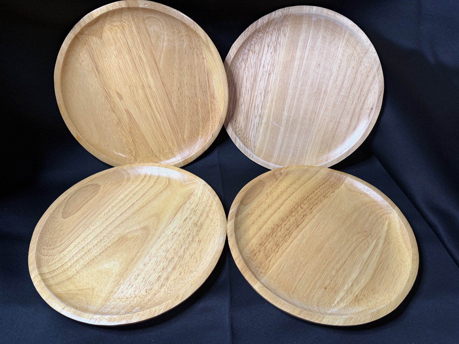 Set of 4 Japanese-style round wooden plates - image 1 of 3