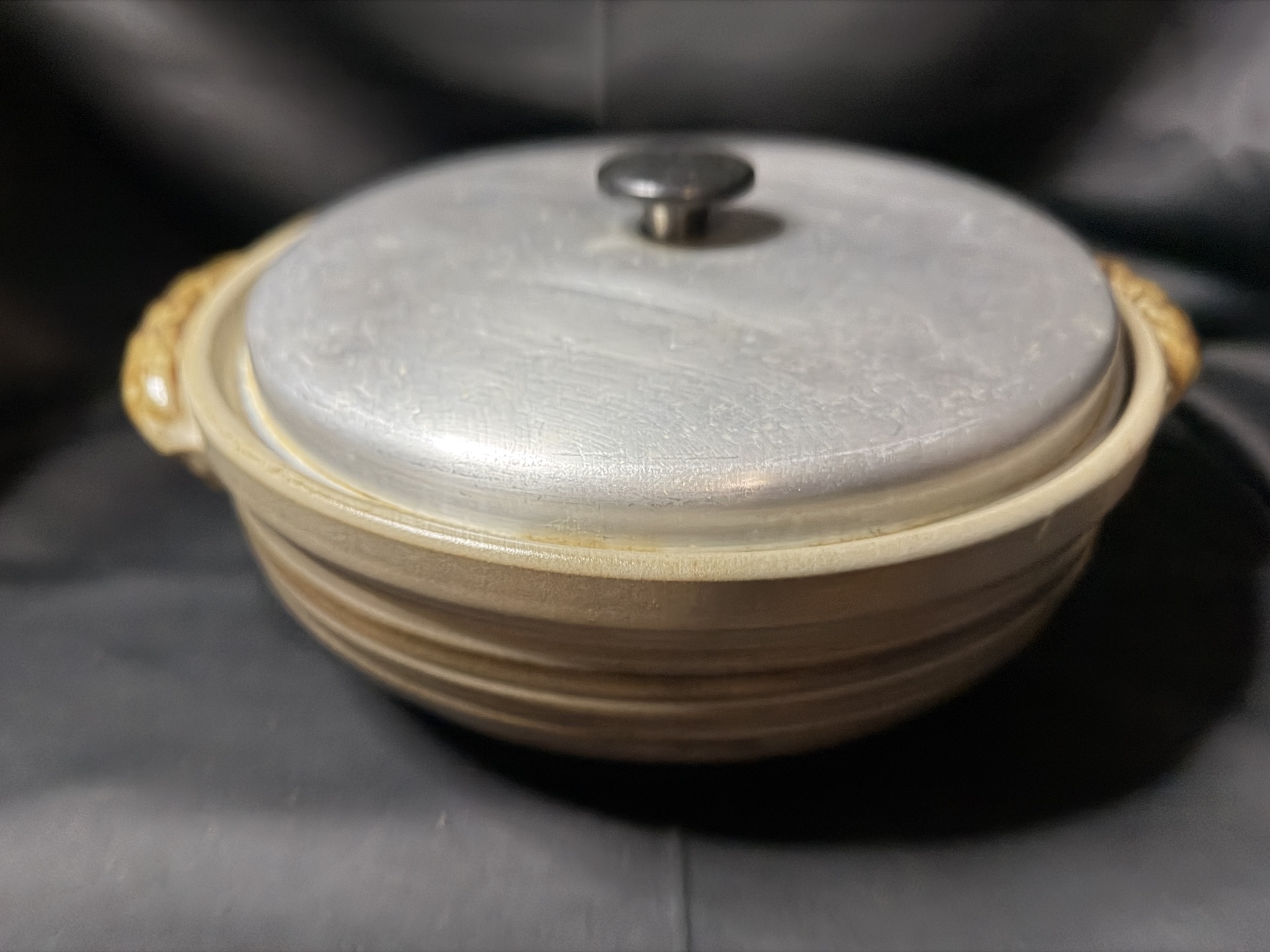 Vintage stoneware serving bowl with a metal lid - image 1 of 5