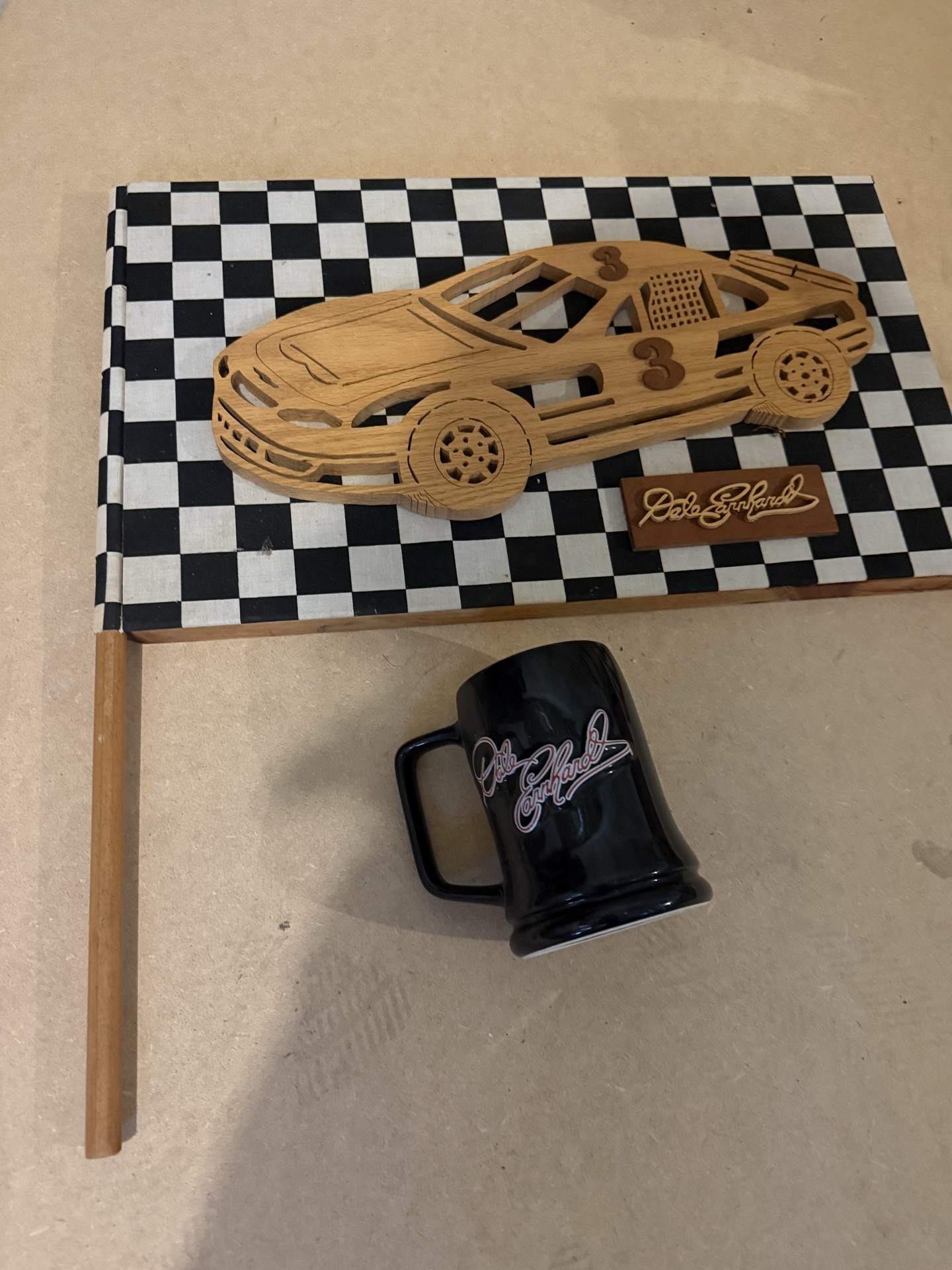 Wooden race car sculpture, black mug, and wooden picture frame - image 1 of 4