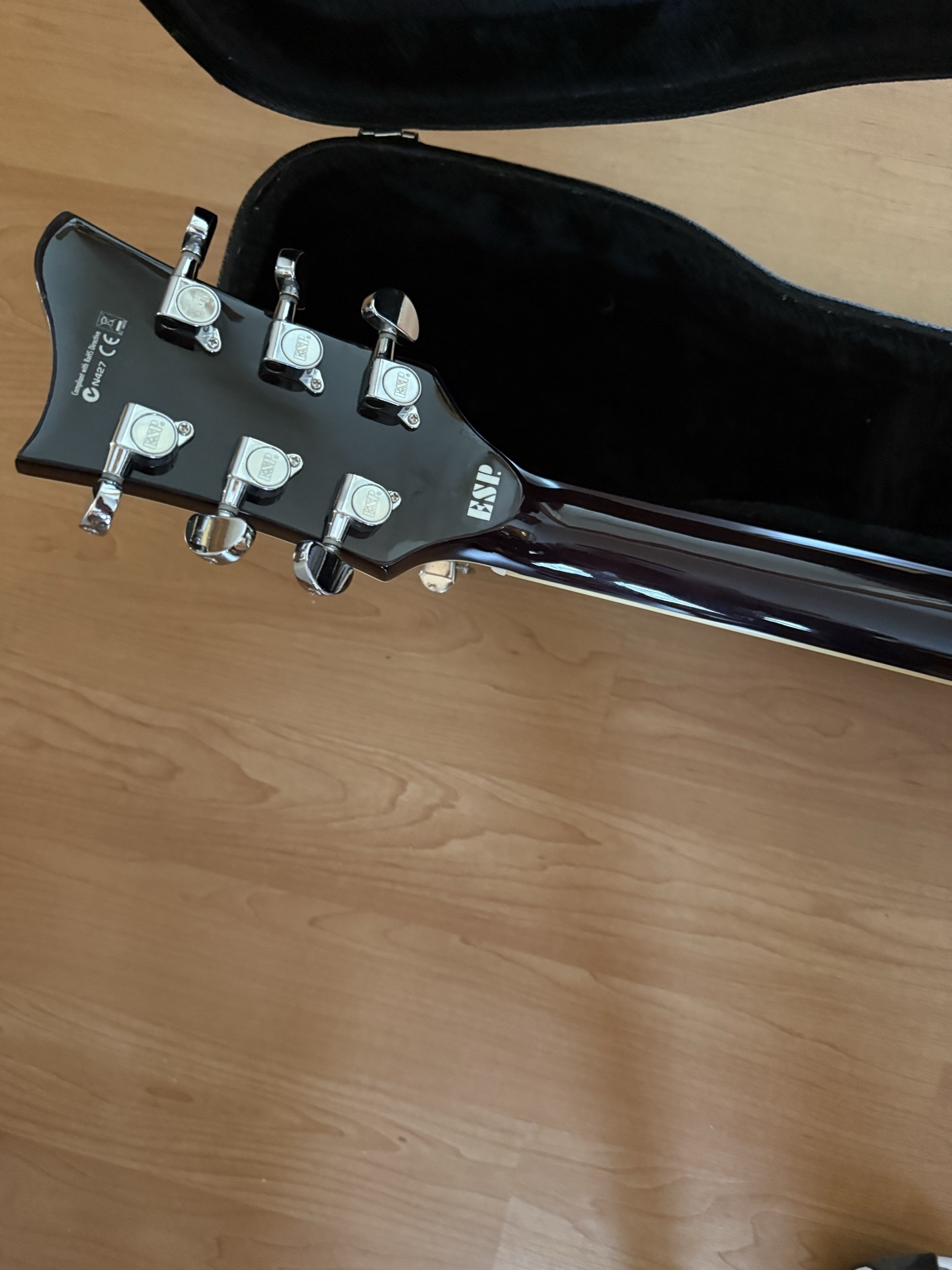 Black acoustic guitar in a hard case - image 5 of 8