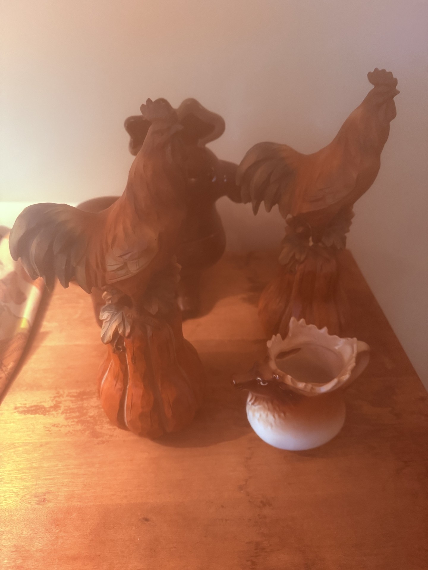 Brown ceramic rooster figurines with a white Vienna Austria porcelain piece - image 1 of 10