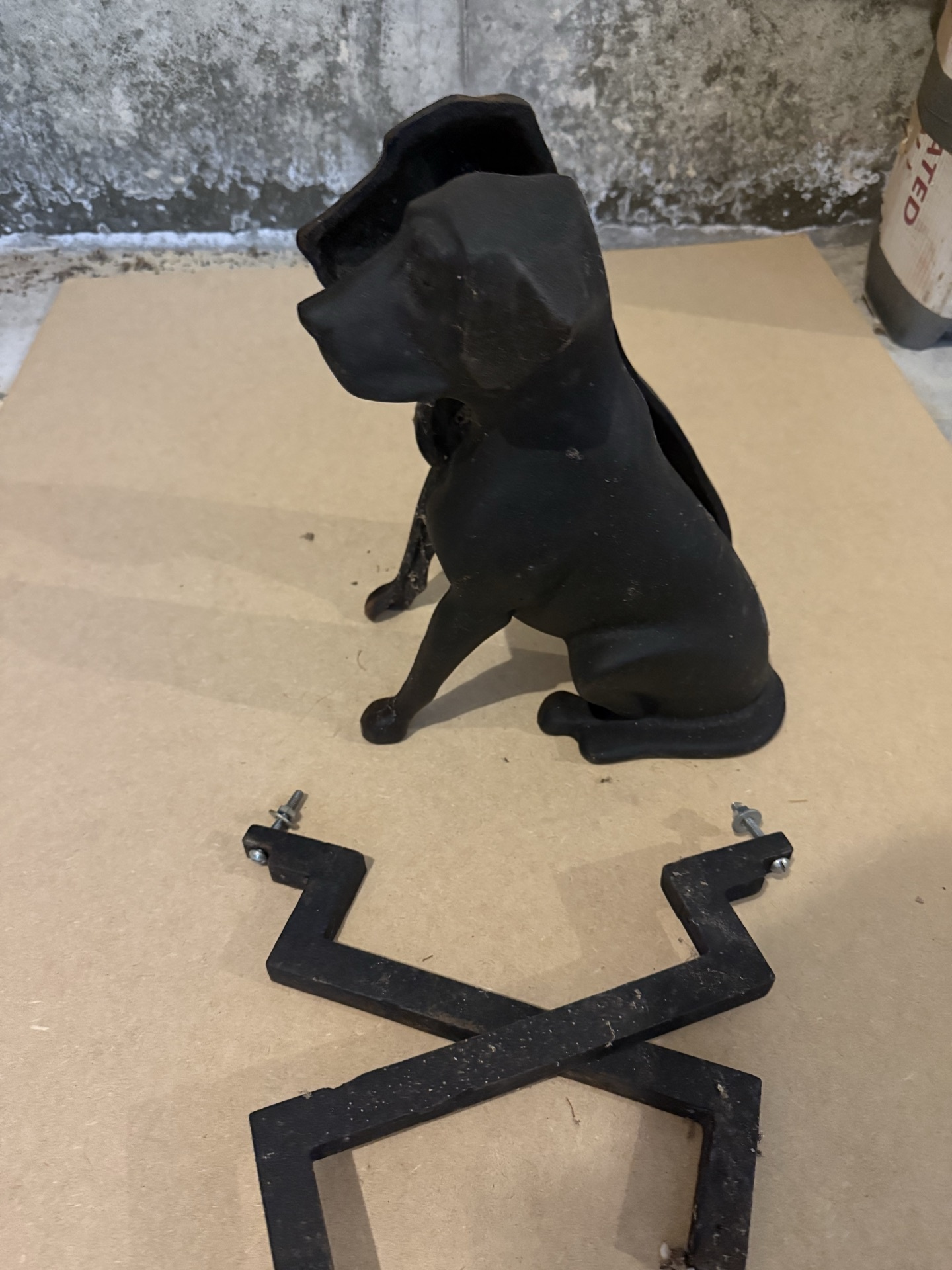 Black dog sculpture with metal angular frames - image 1 of 4