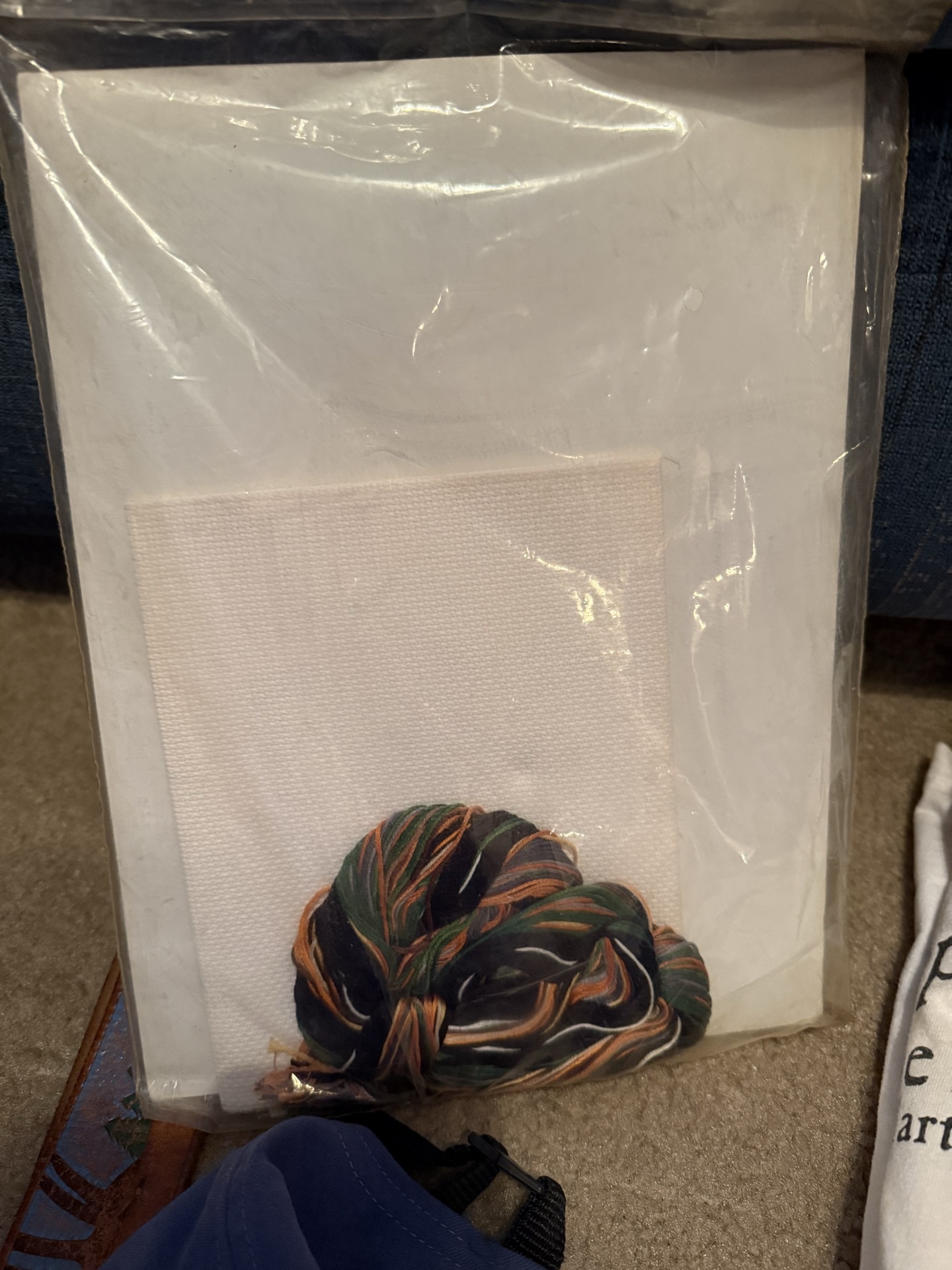 Wildlife-themed clothing, accessories, and cross-stitch kits - image 8 of 9