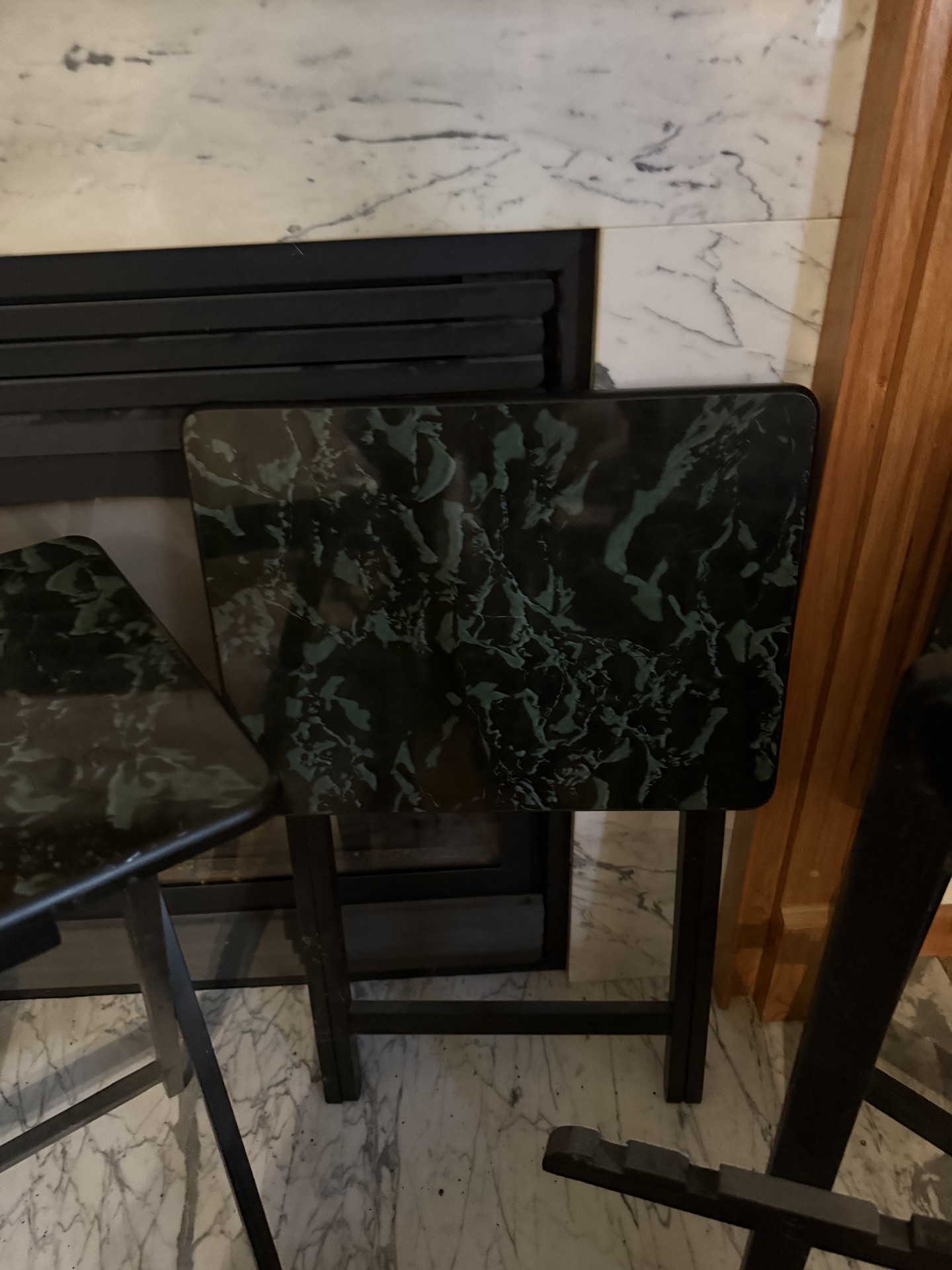 Black metal folding tables with green marble-pattern laminate tops - image 2 of 8