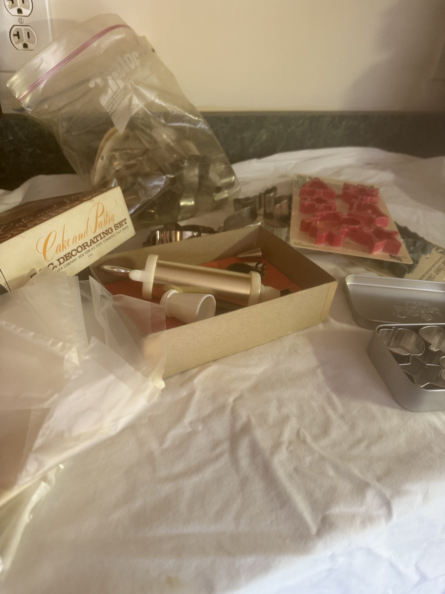 Assorted cookie cutters and cake decorating tools - image 1 of 7