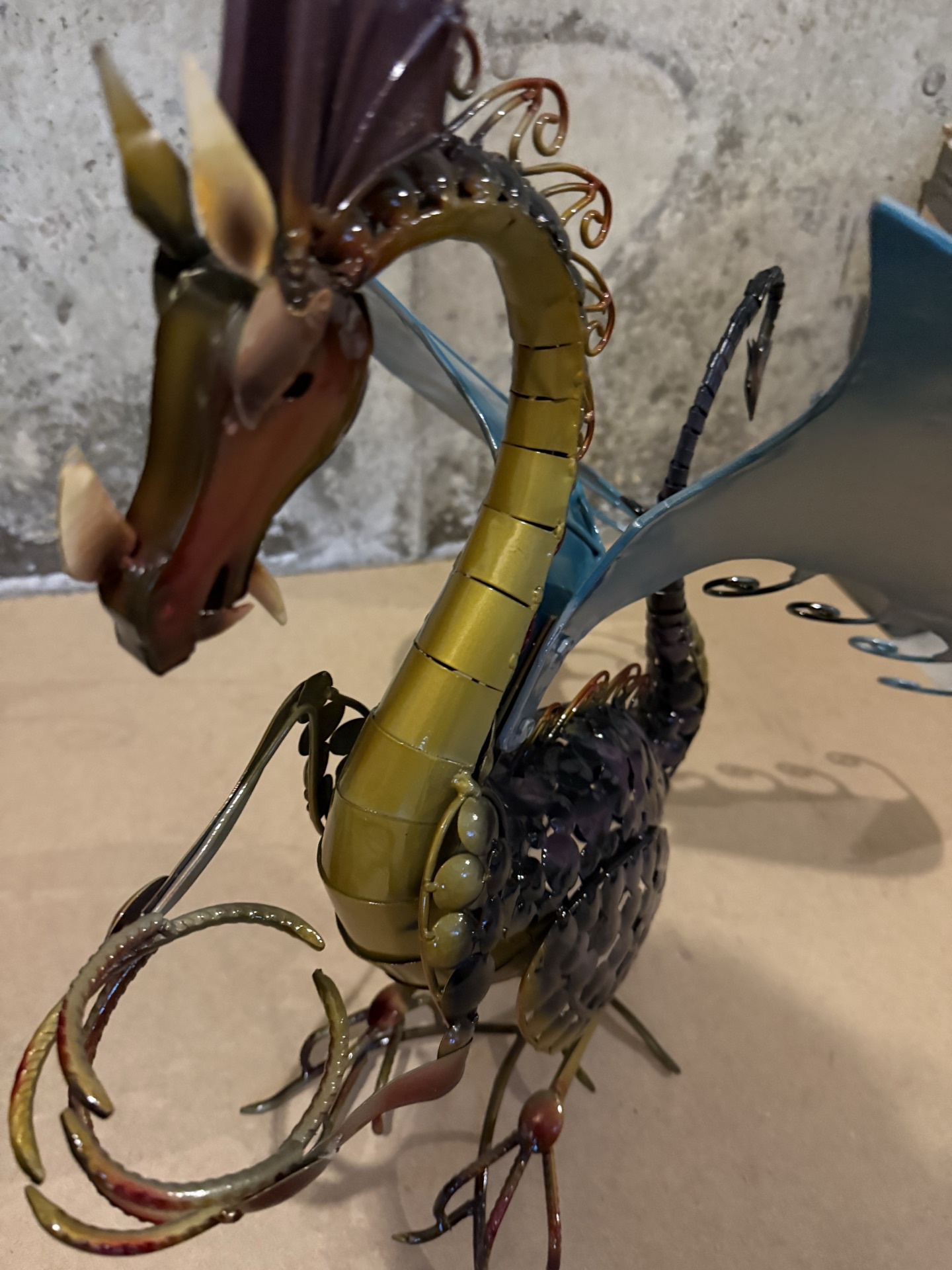 Metal dragon sculpture with blue wings - image 2 of 5