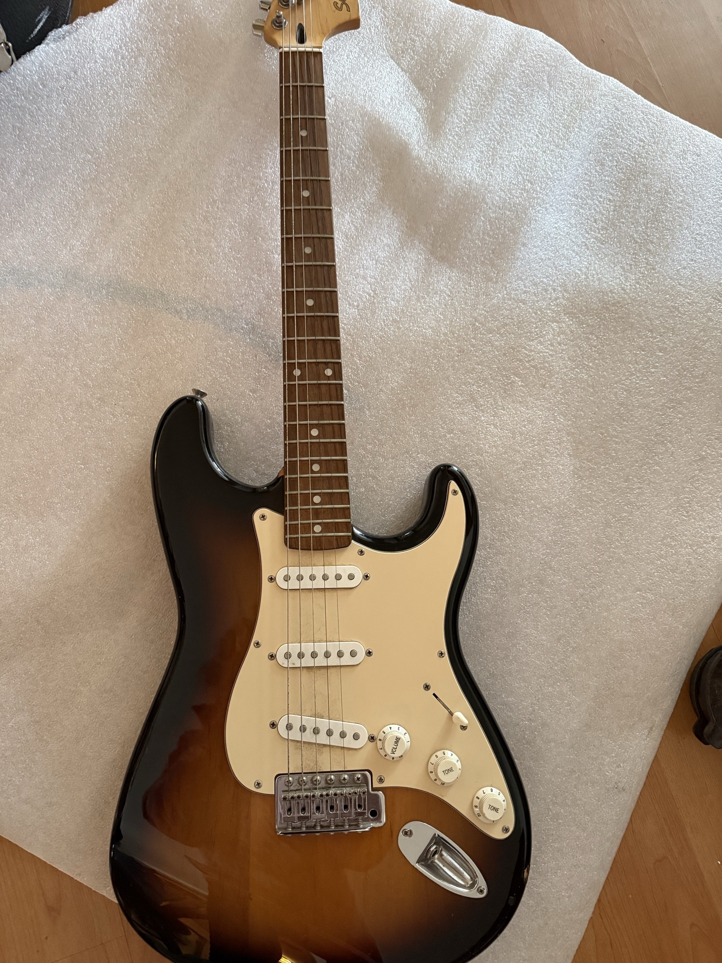 Squier by Fender Stratocaster electric guitar with gig bag - image 1 of 8