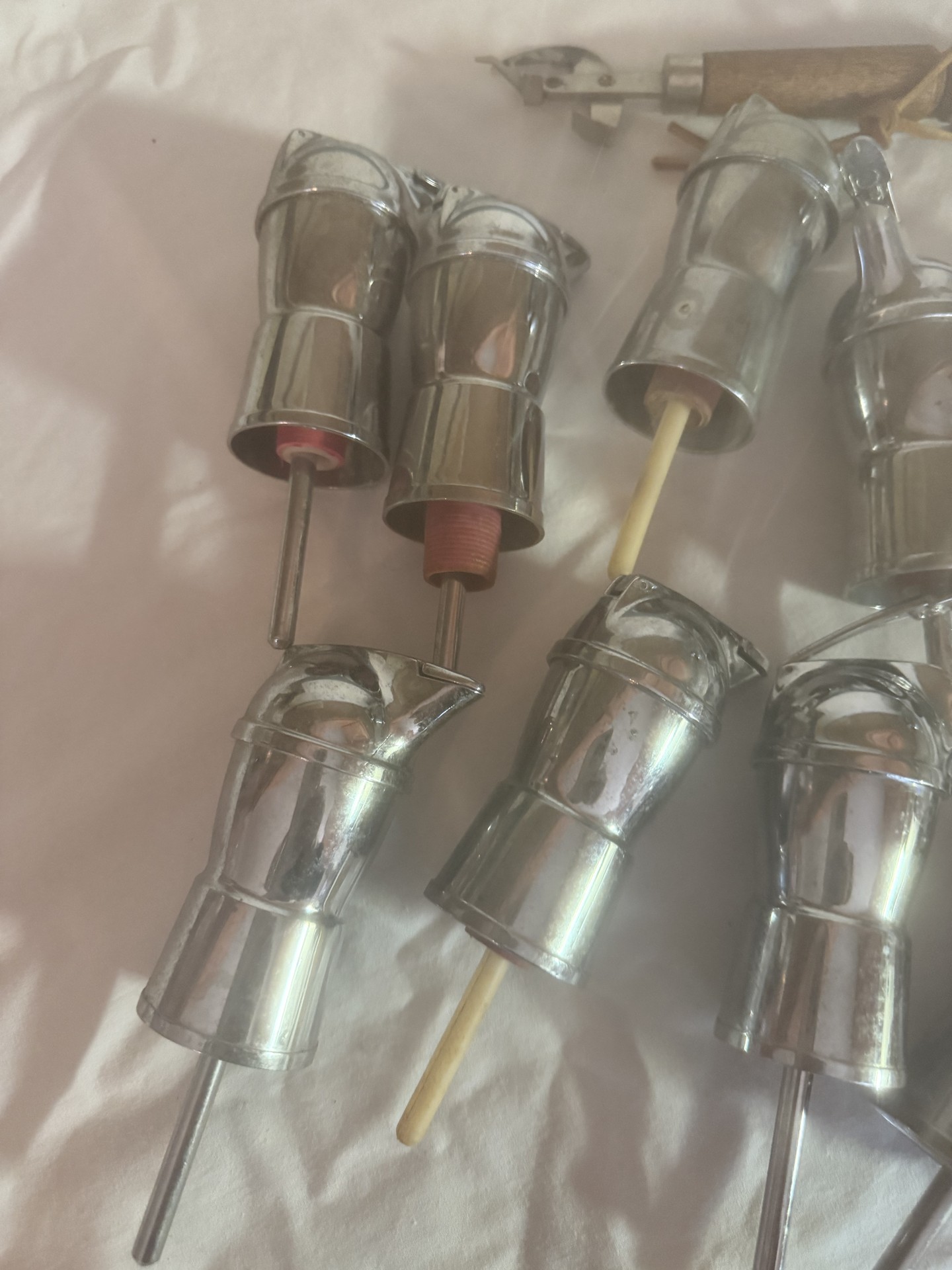 Set of small metal cylindrical components with rods - image 2 of 3