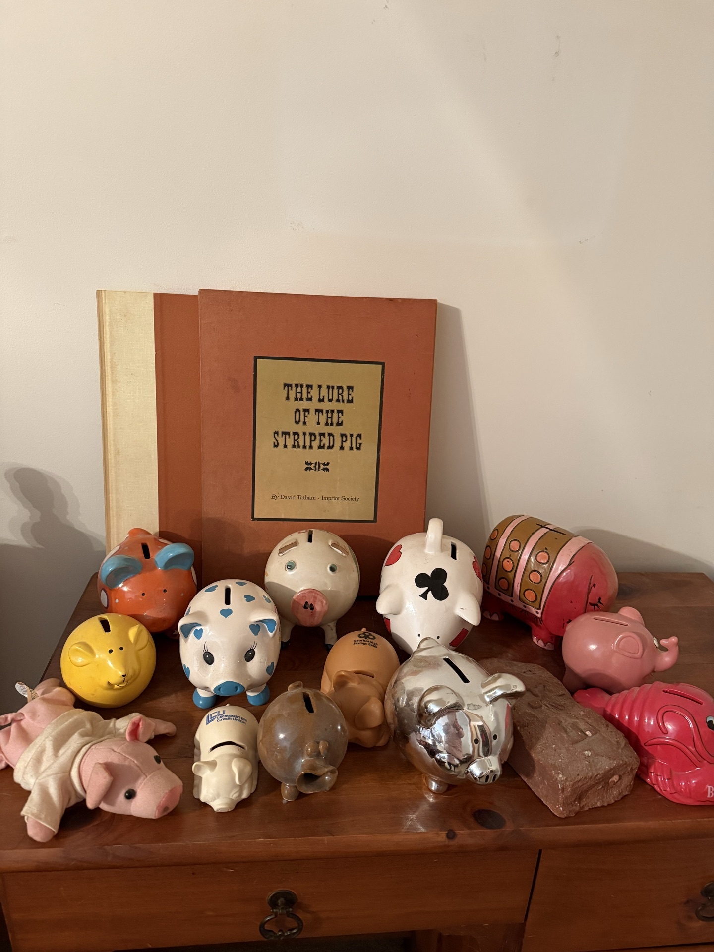 Assorted Piggy Banks and a Vintage Book - image 1 of 4