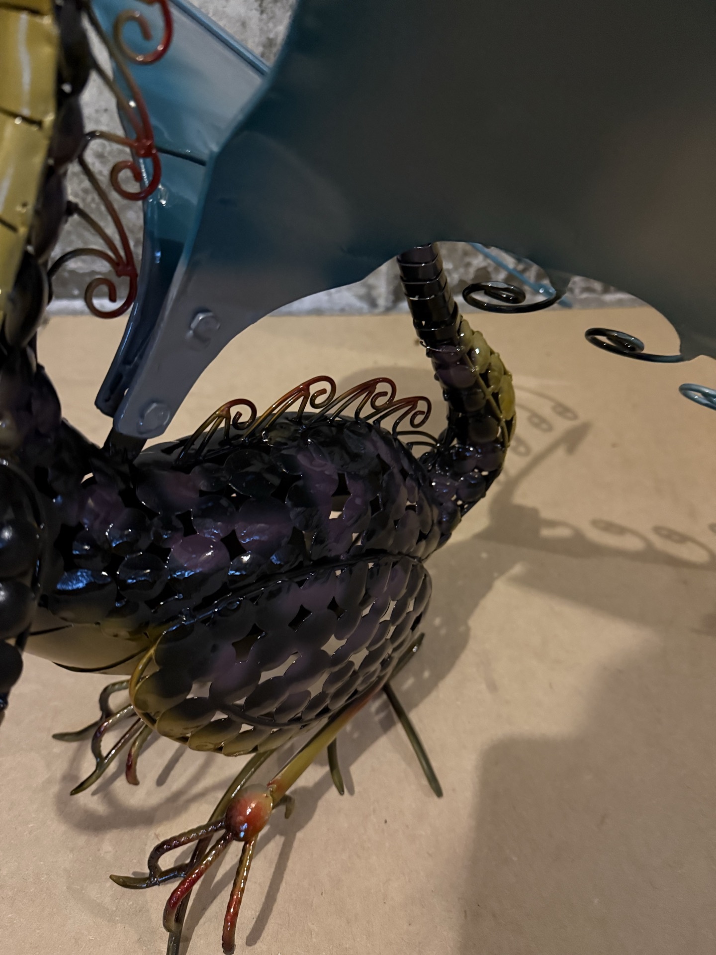 Metal dragon sculpture with blue wings - image 3 of 5