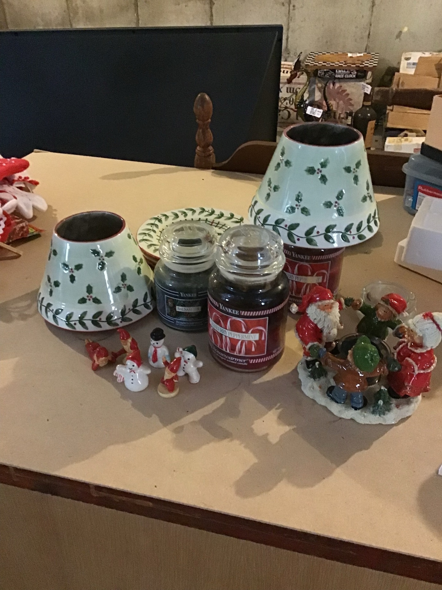 Christmas-themed decor: ceramic lamp bases, candles, plate, and figurines - image 1 of 2