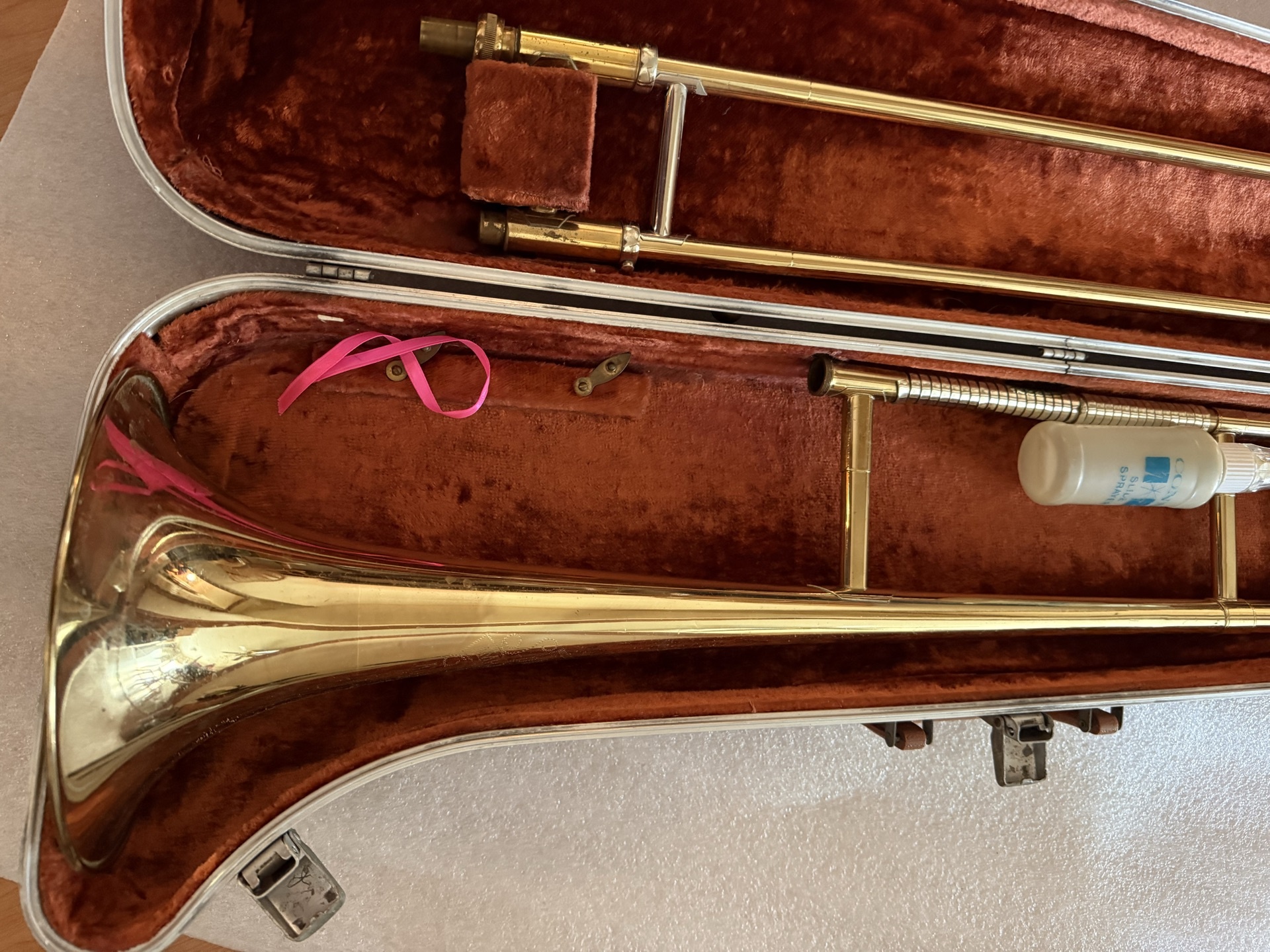 Brass trombone in a brown plush-lined case - image 2 of 7