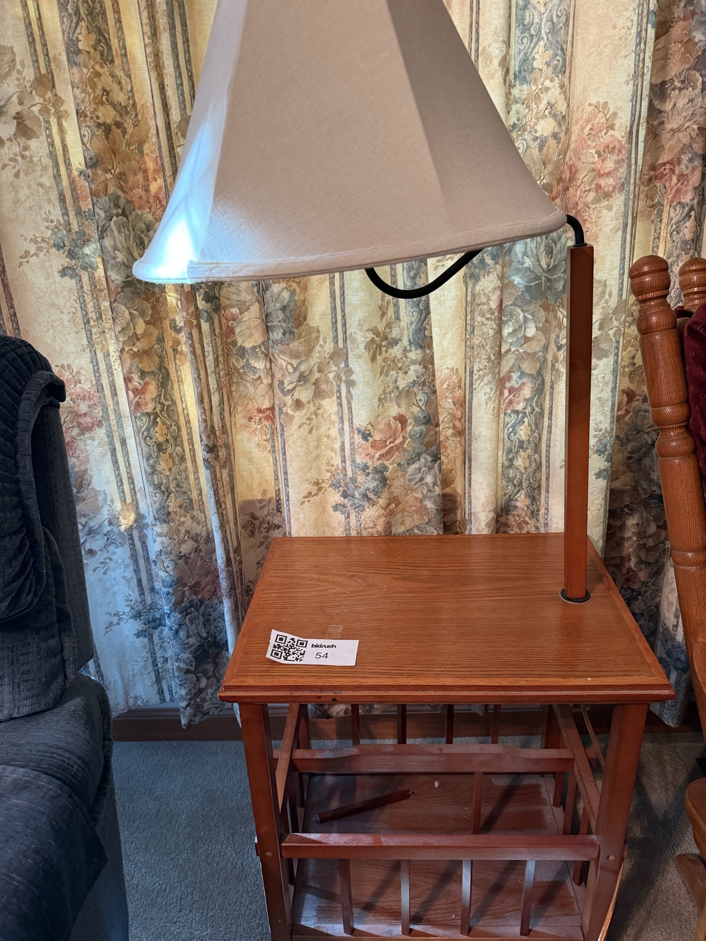 Wooden lamp table with built-in magazine rack and lamp - image 1 of 4