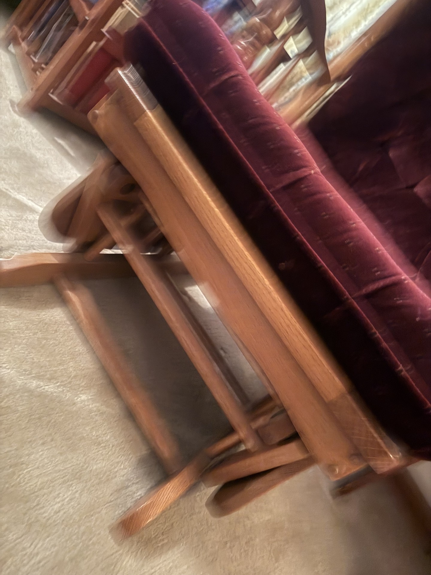 Wooden glider chair with matching burgundy tufted ottoman - image 7 of 12