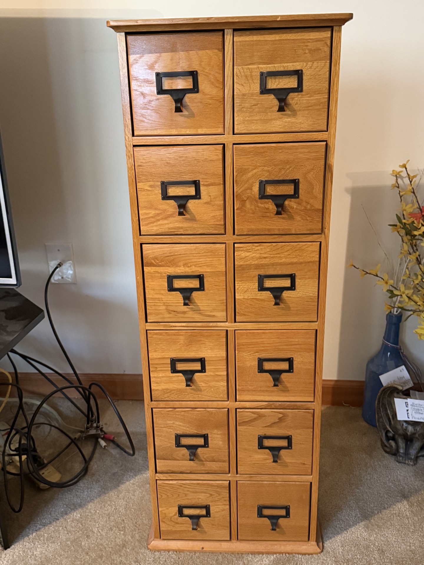 Oak-finished tall cabinet with multiple small drawers - image 12 of 12