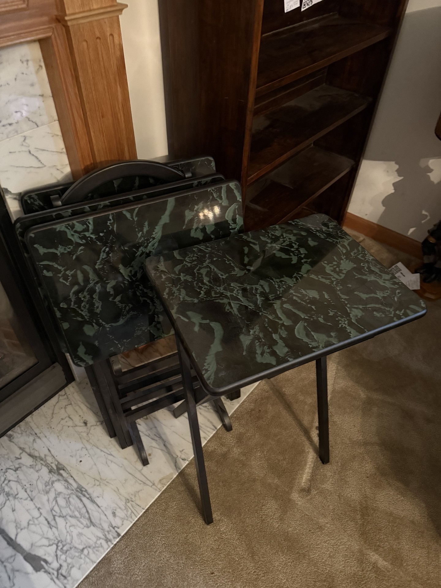 Black metal folding tables with green marble-pattern laminate tops - image 5 of 8