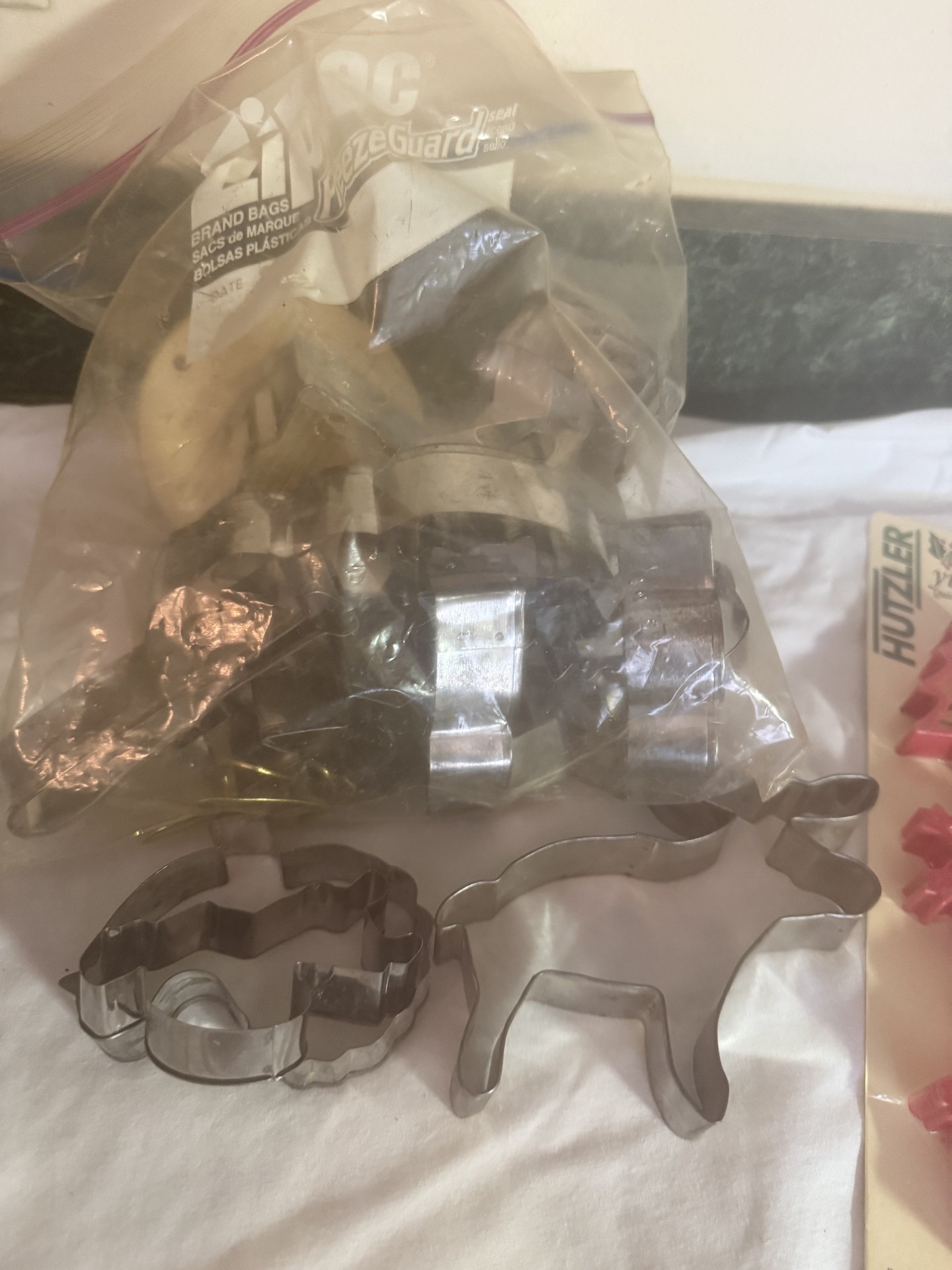 Assorted cookie cutters and cake decorating tools - image 6 of 7