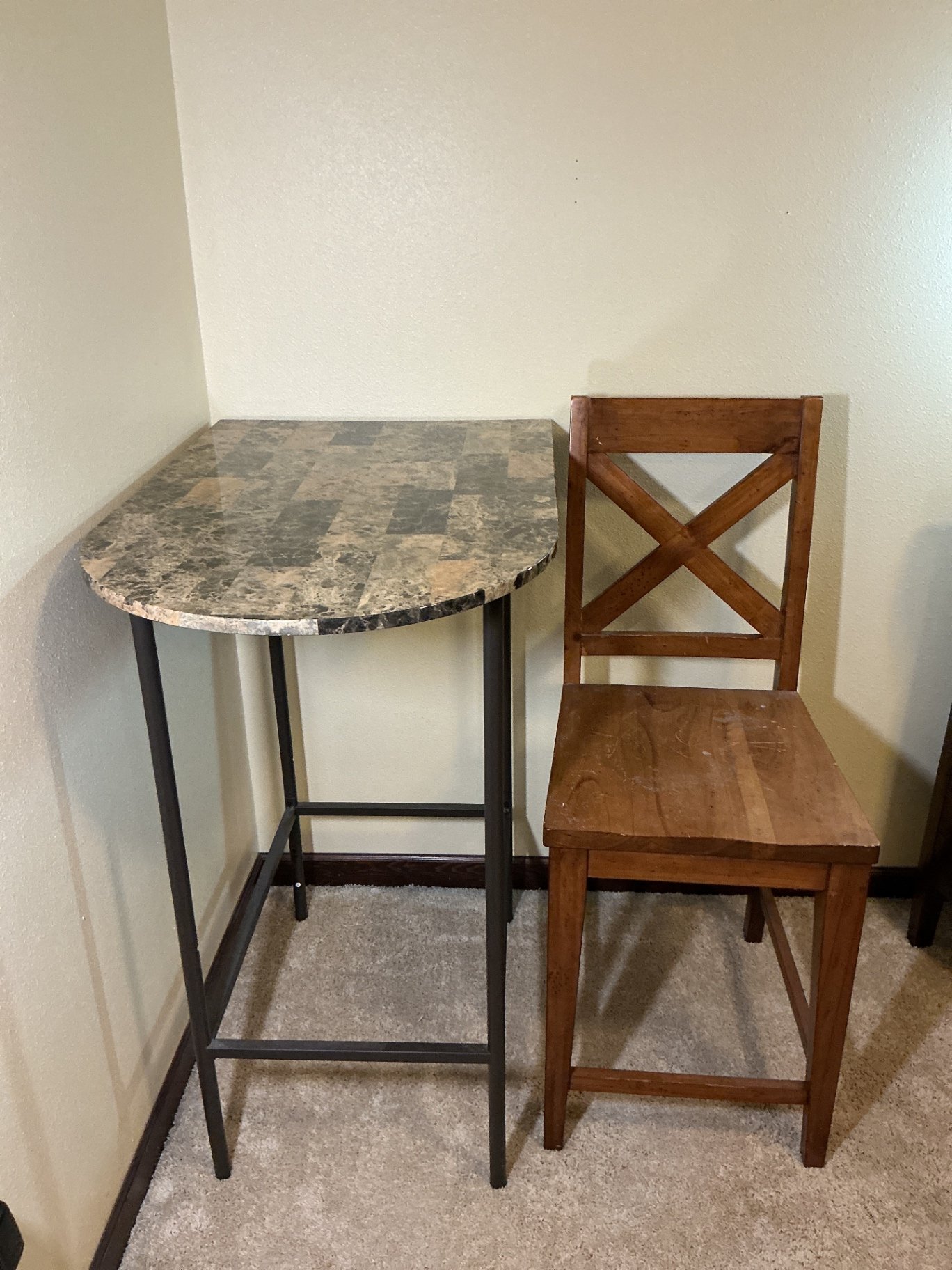 Wooden X-back chair with a marble like table - image 1 of 6