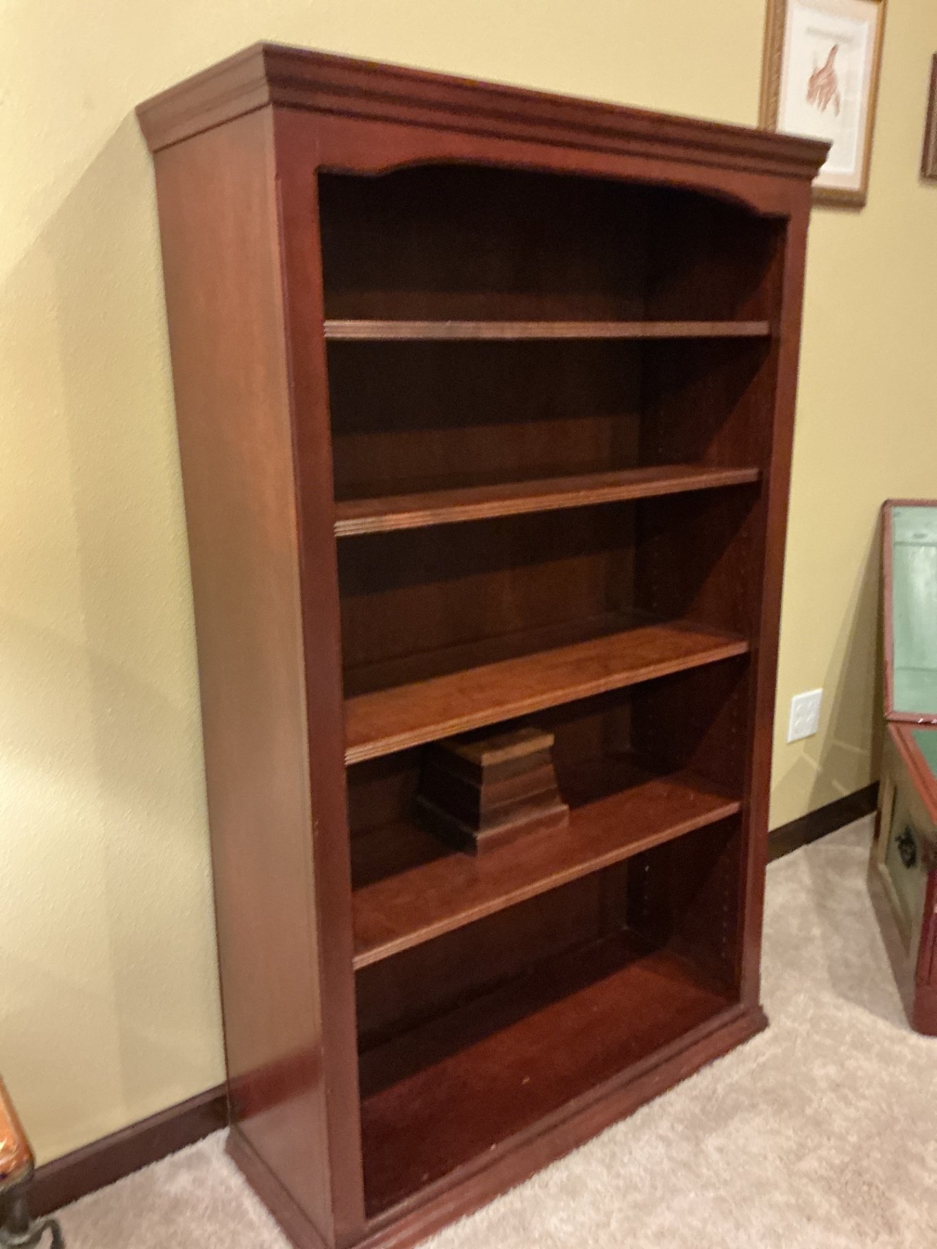 Dark wood bookshelf with five shelves and a stepped pedestal - image 2 of 4