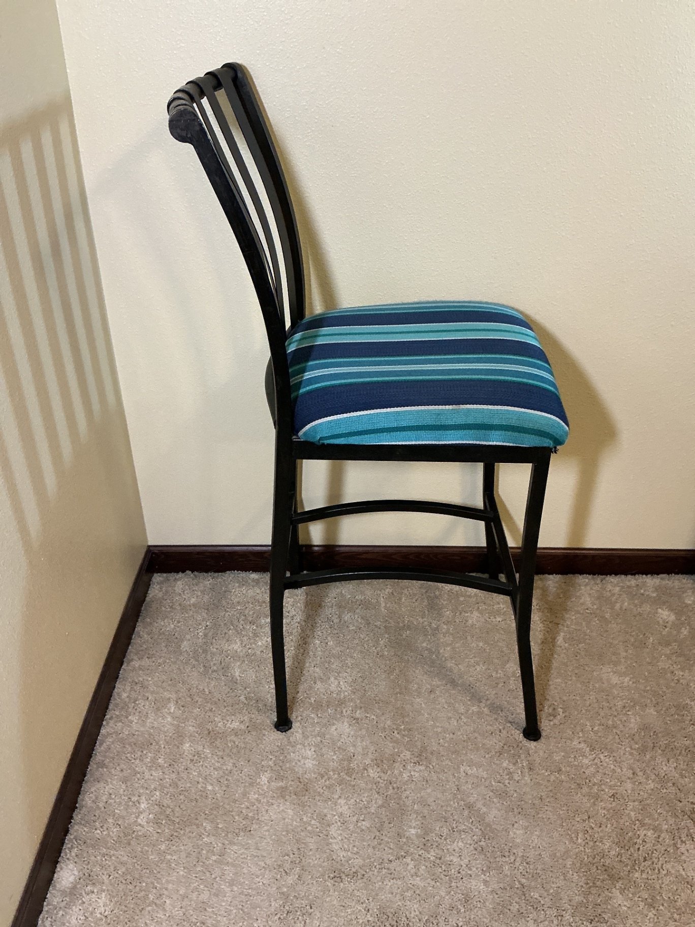 Pair of black metal bar stools with striped upholstery - image 3 of 5