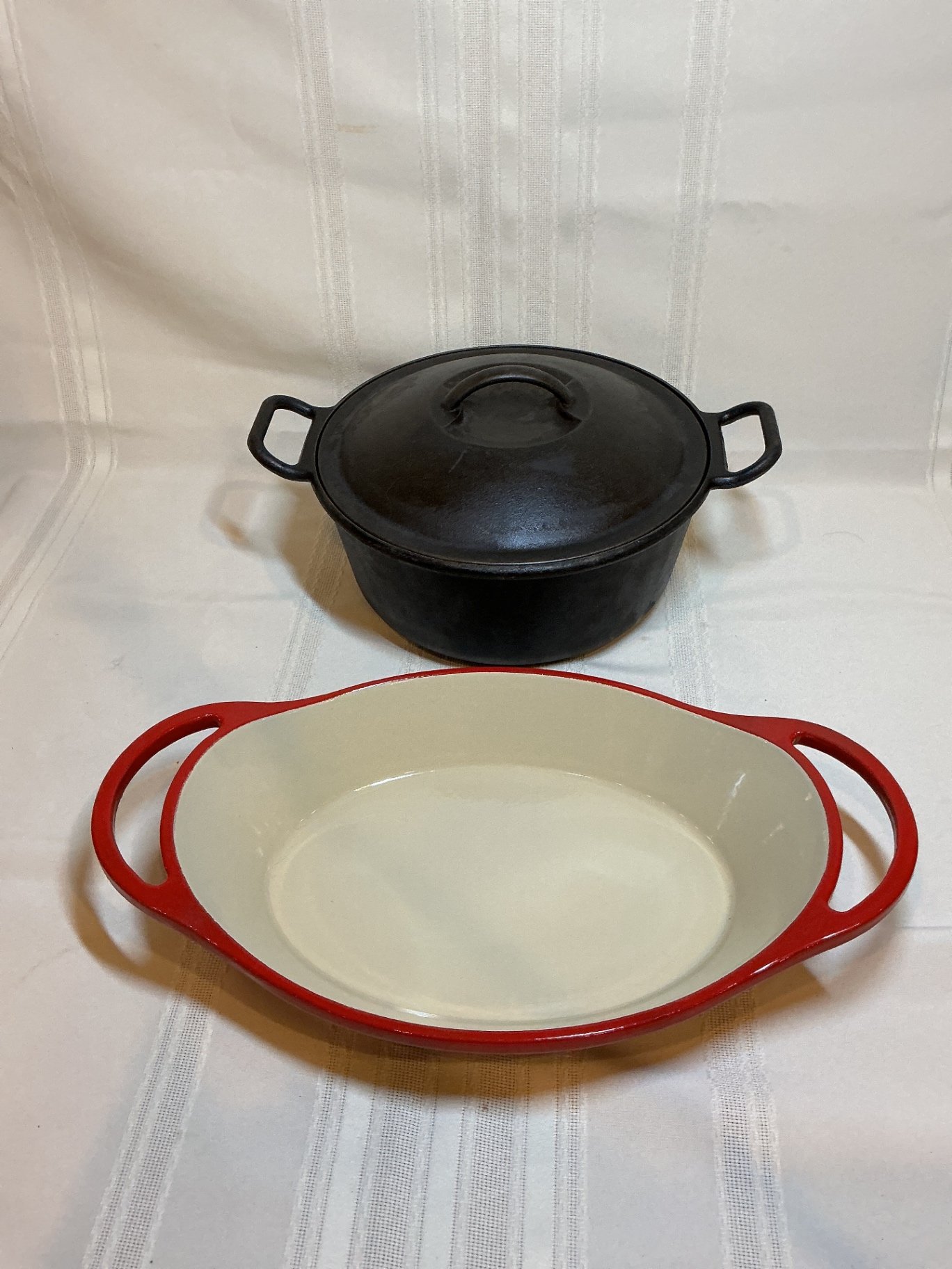 Lodge Cast iron dutch oven and enamel oval dish - image 1 of 5