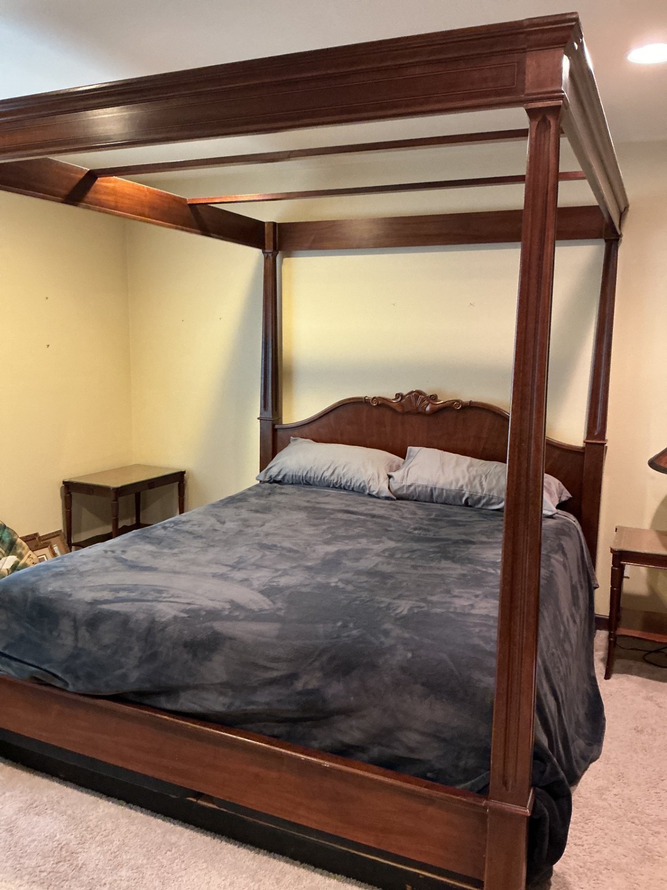 Wooden four-poster king canopy bed with carved headboard - image 1 of 9