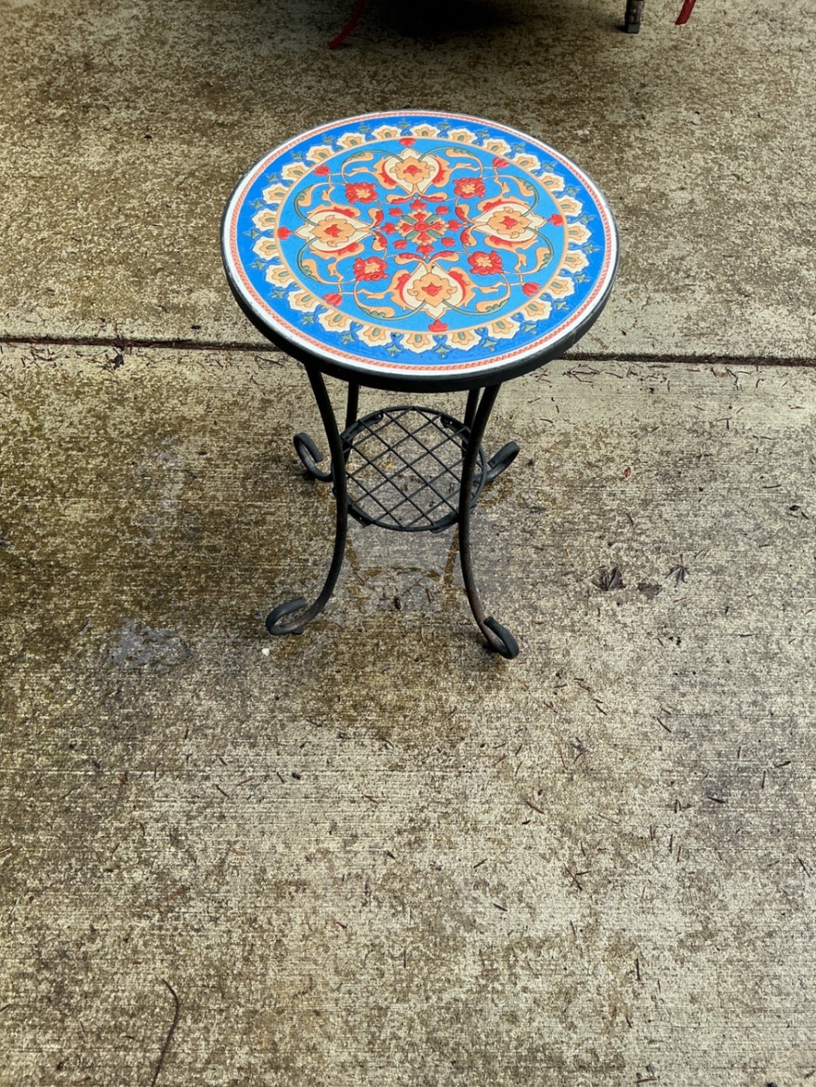 Outdoor wicker chaise lounges with red cushions and mosaic-topped table - image 5 of 6