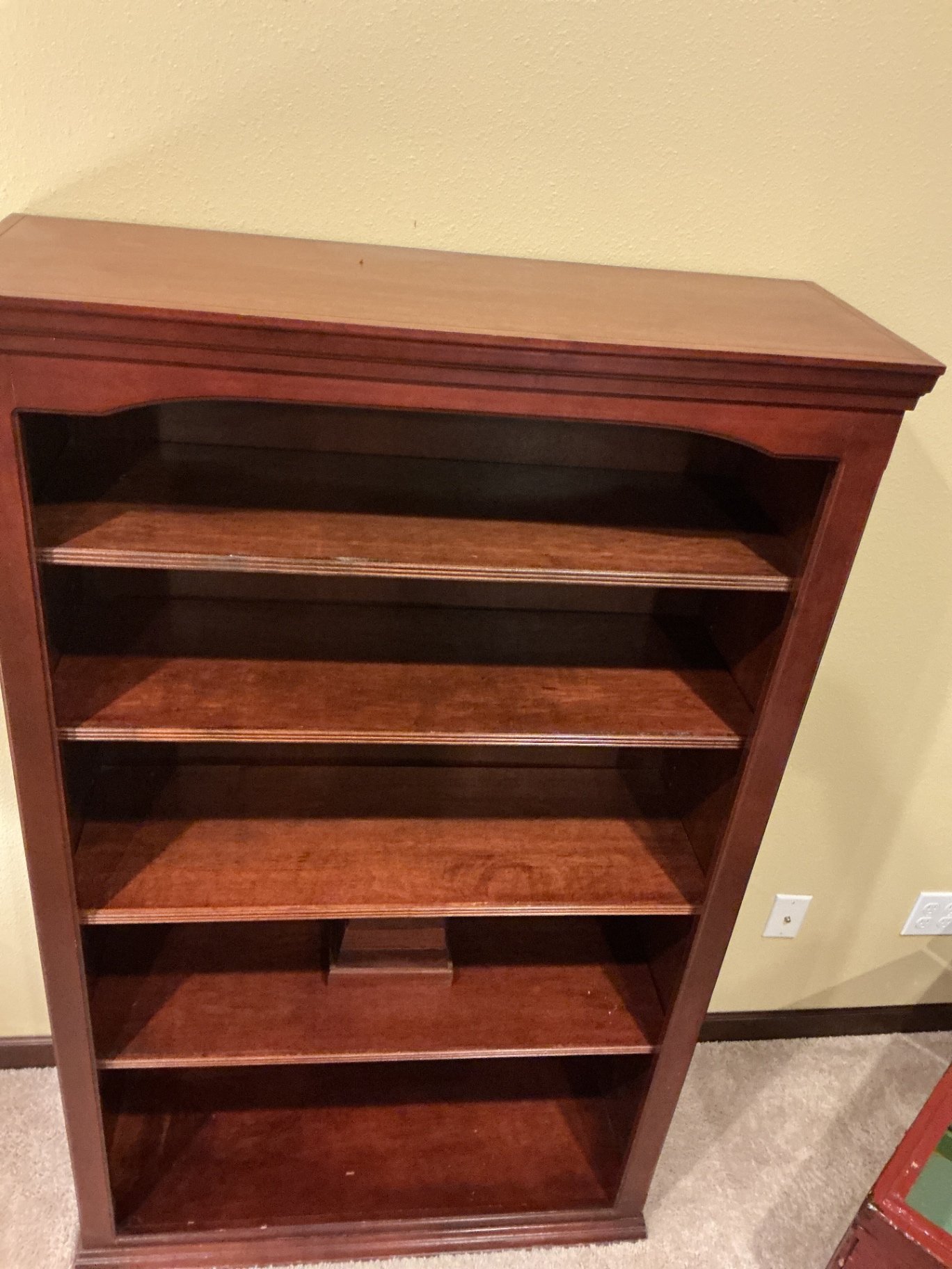 Dark wood bookshelf with five shelves and a stepped pedestal - image 3 of 4