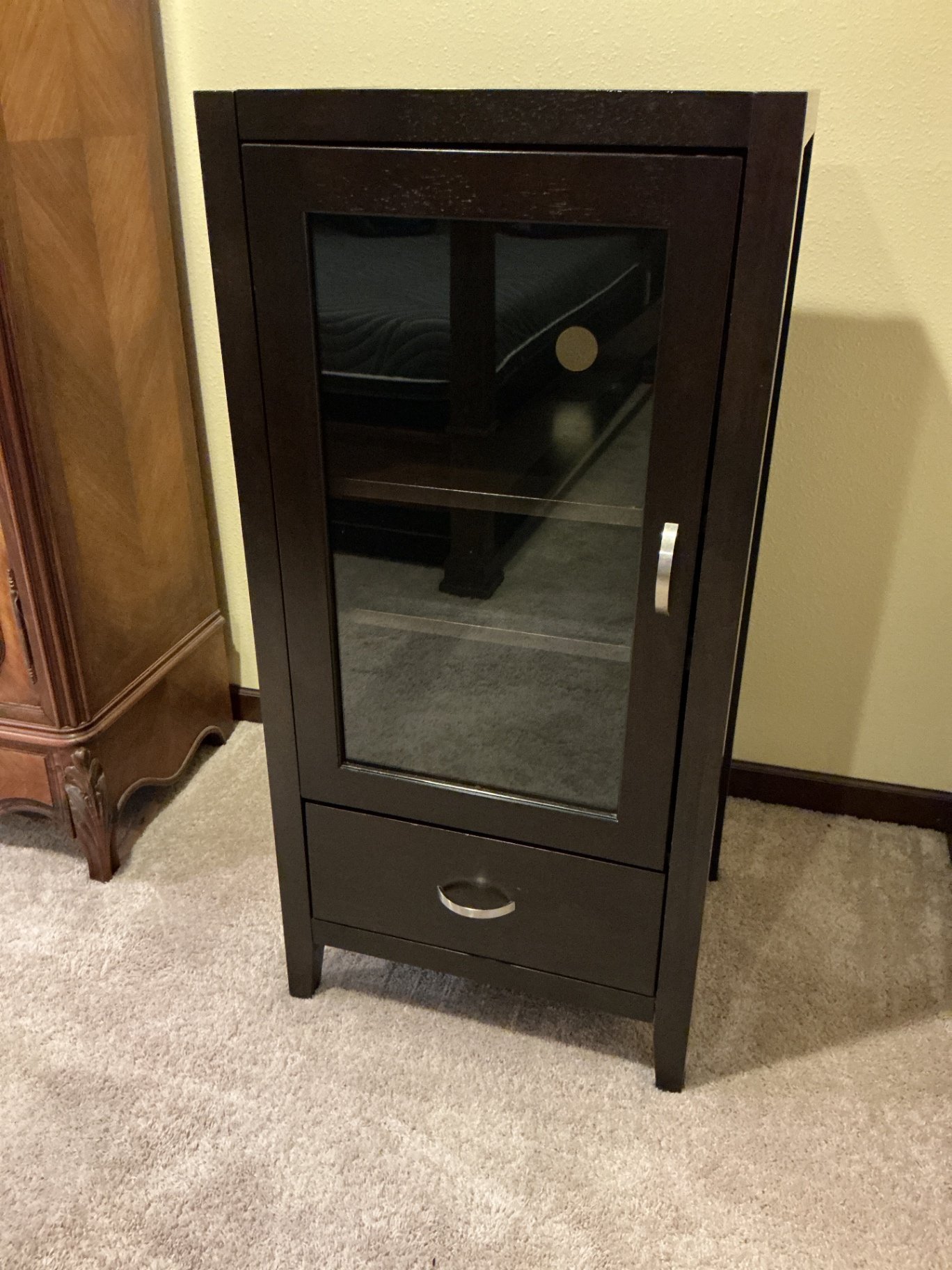 Dark wood display cabinet with glass door and drawer - image 1 of 5