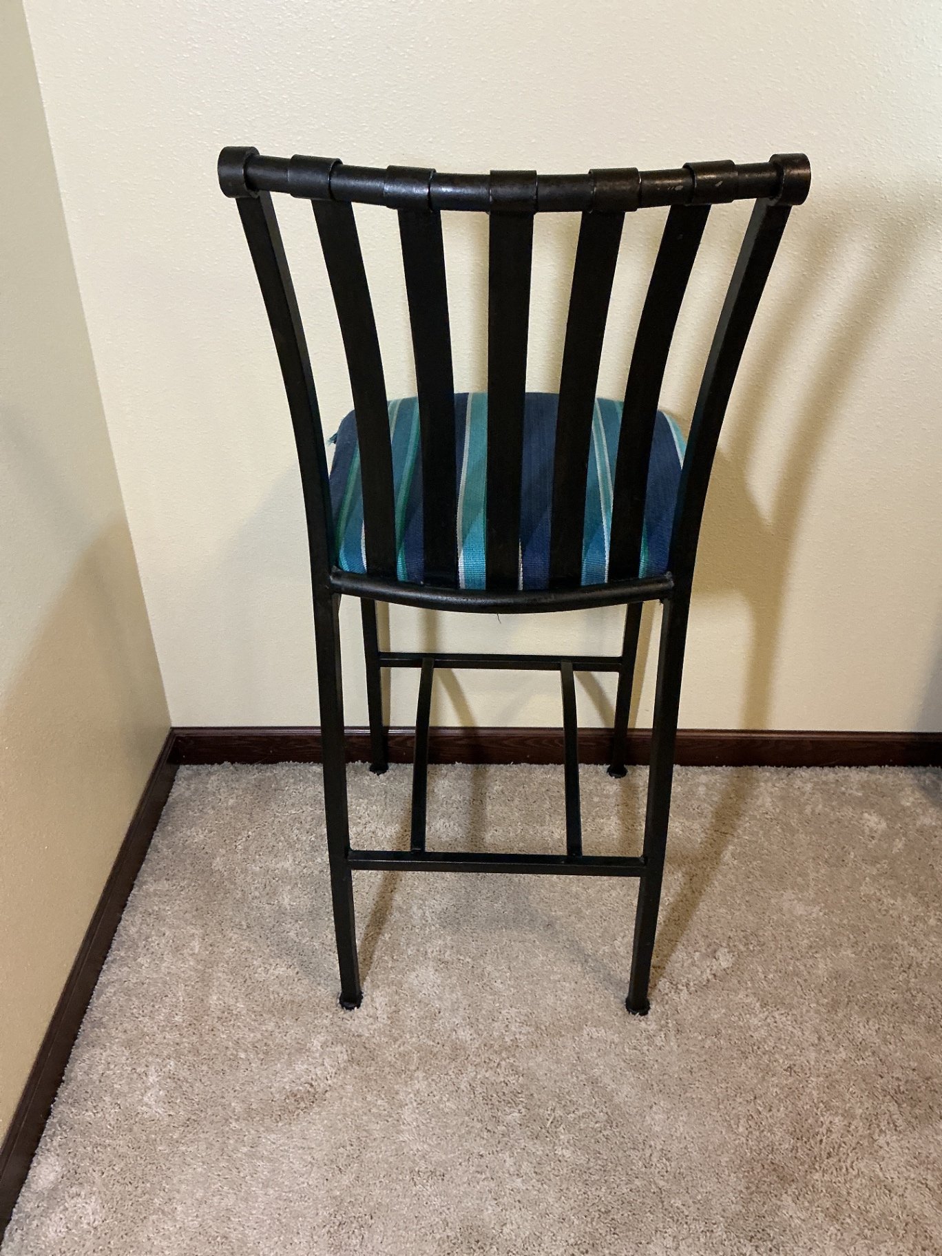 Pair of black metal bar stools with striped upholstery - image 4 of 5