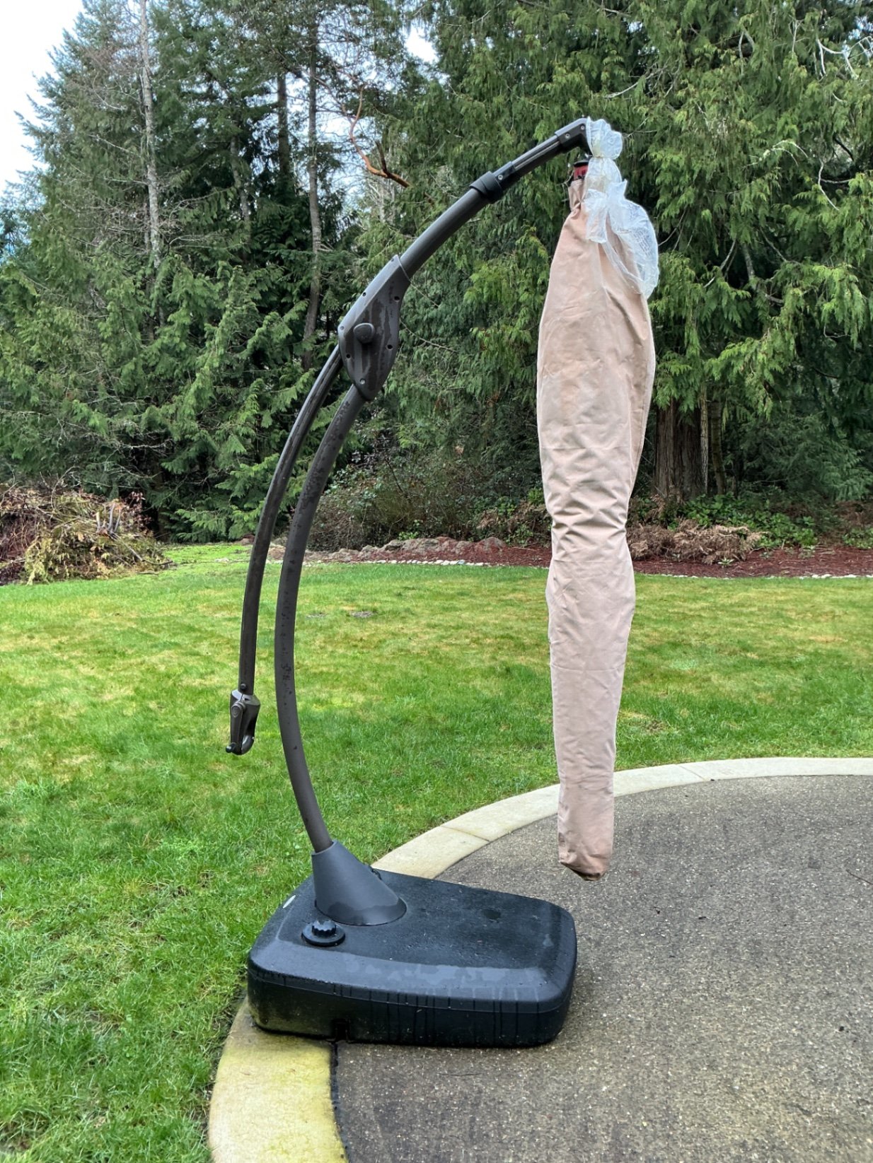 Large Red cantilever patio umbrella with base and protective sleeve - image 5 of 6