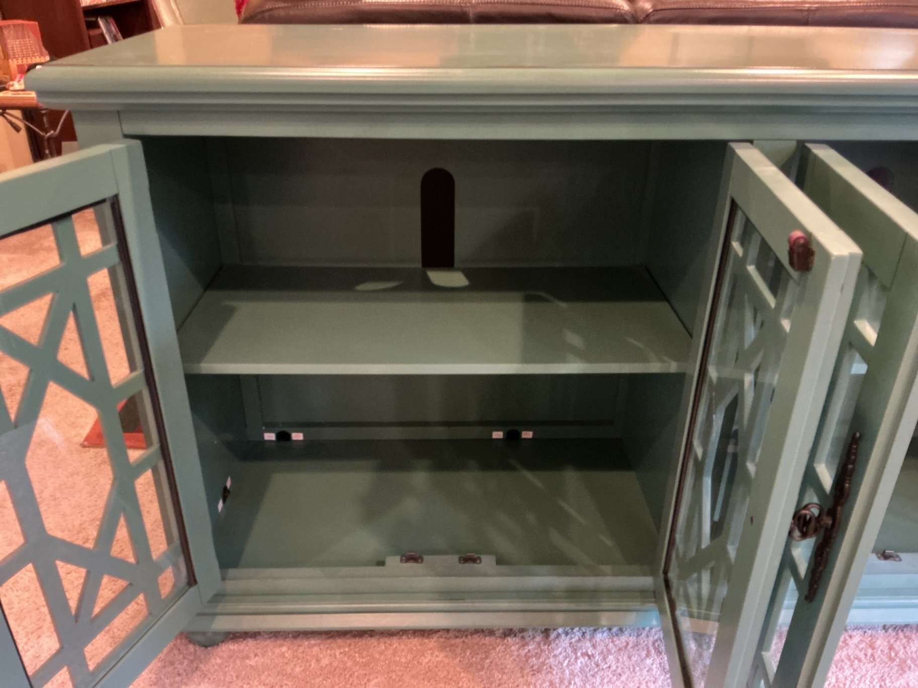 Teal-green lattice-door cabinet - image 2 of 6