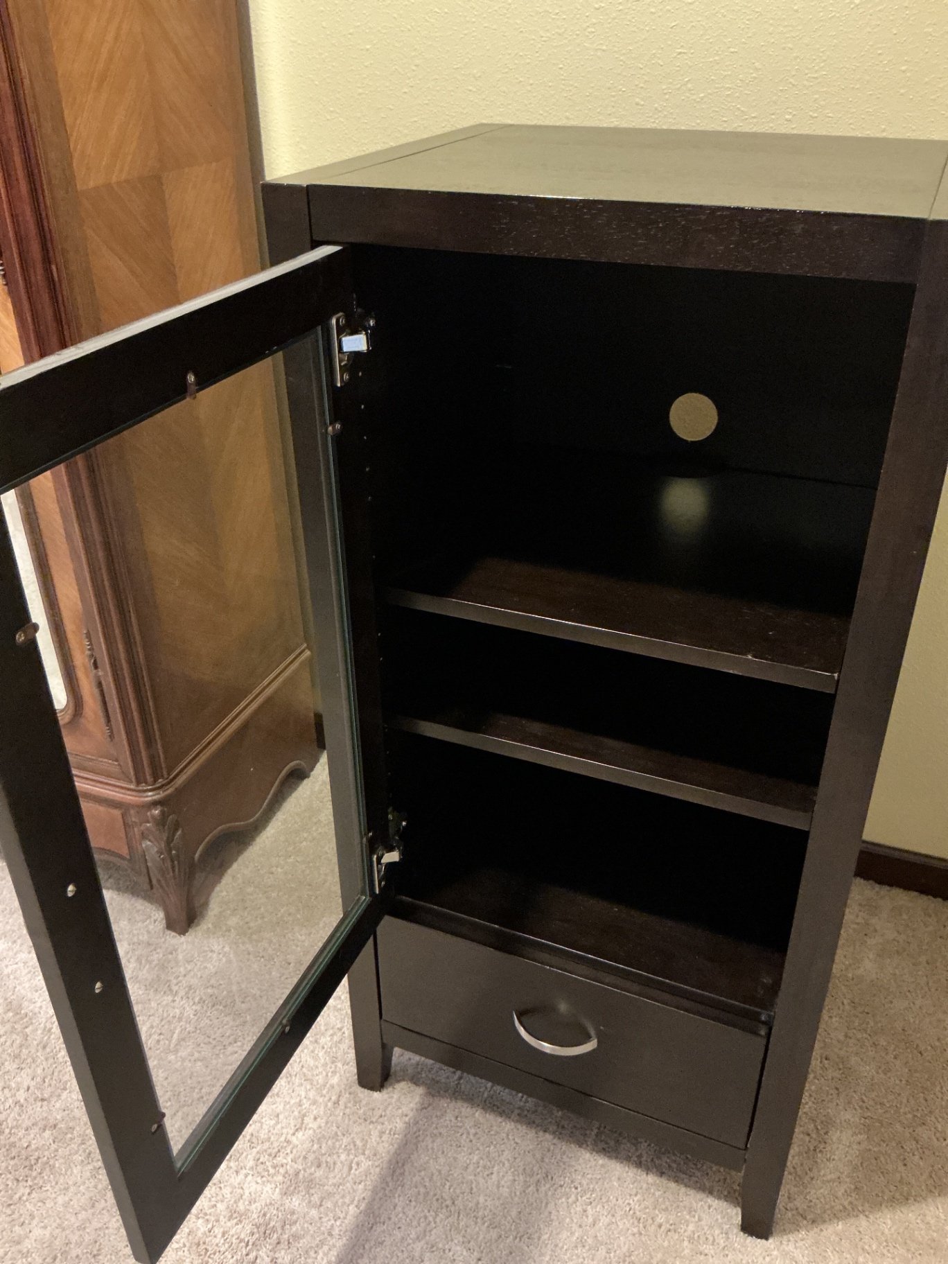 Dark wood display cabinet with glass door and drawer - image 3 of 5