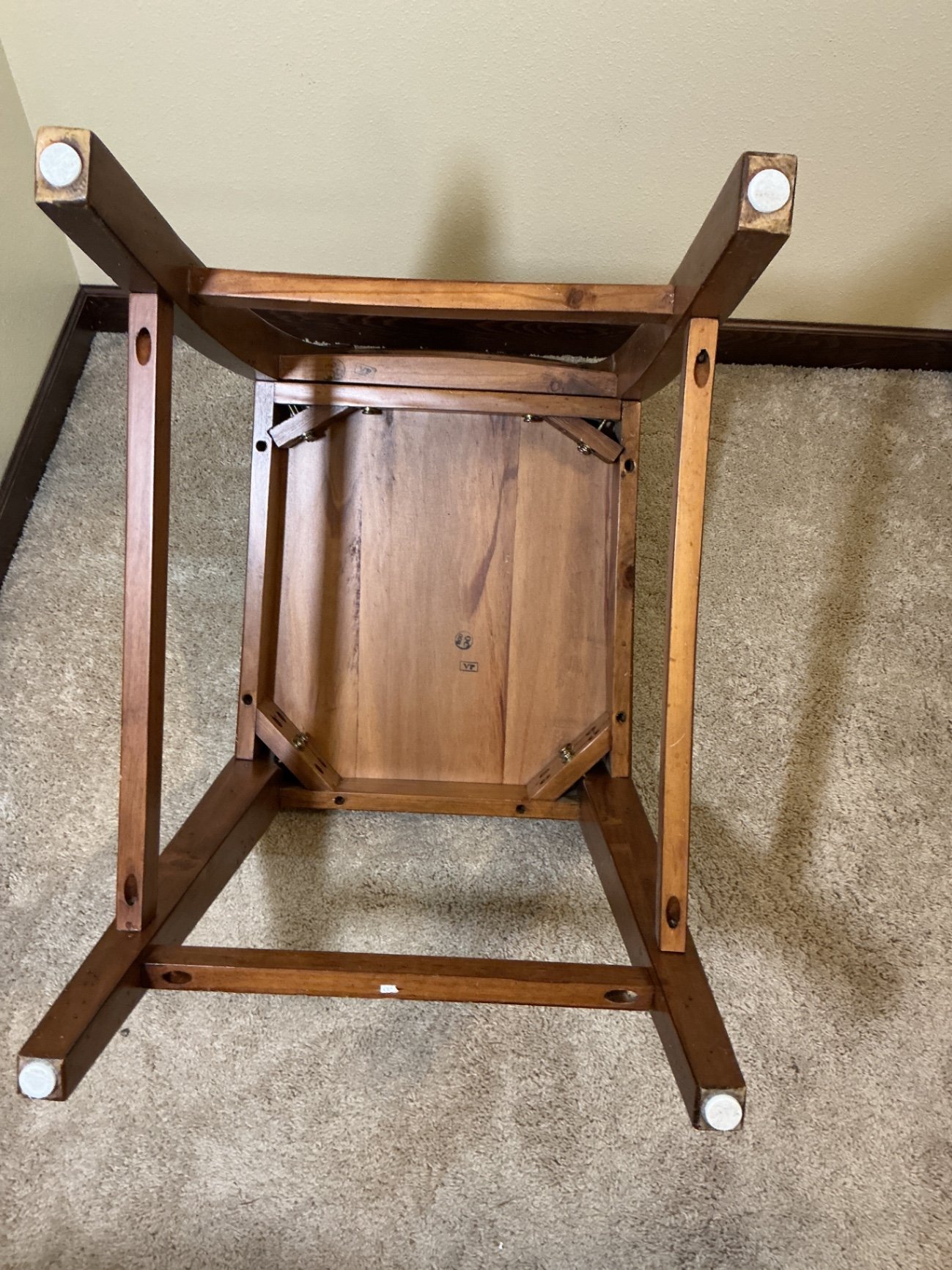 Wooden X-back chair with a marble like table - image 6 of 6