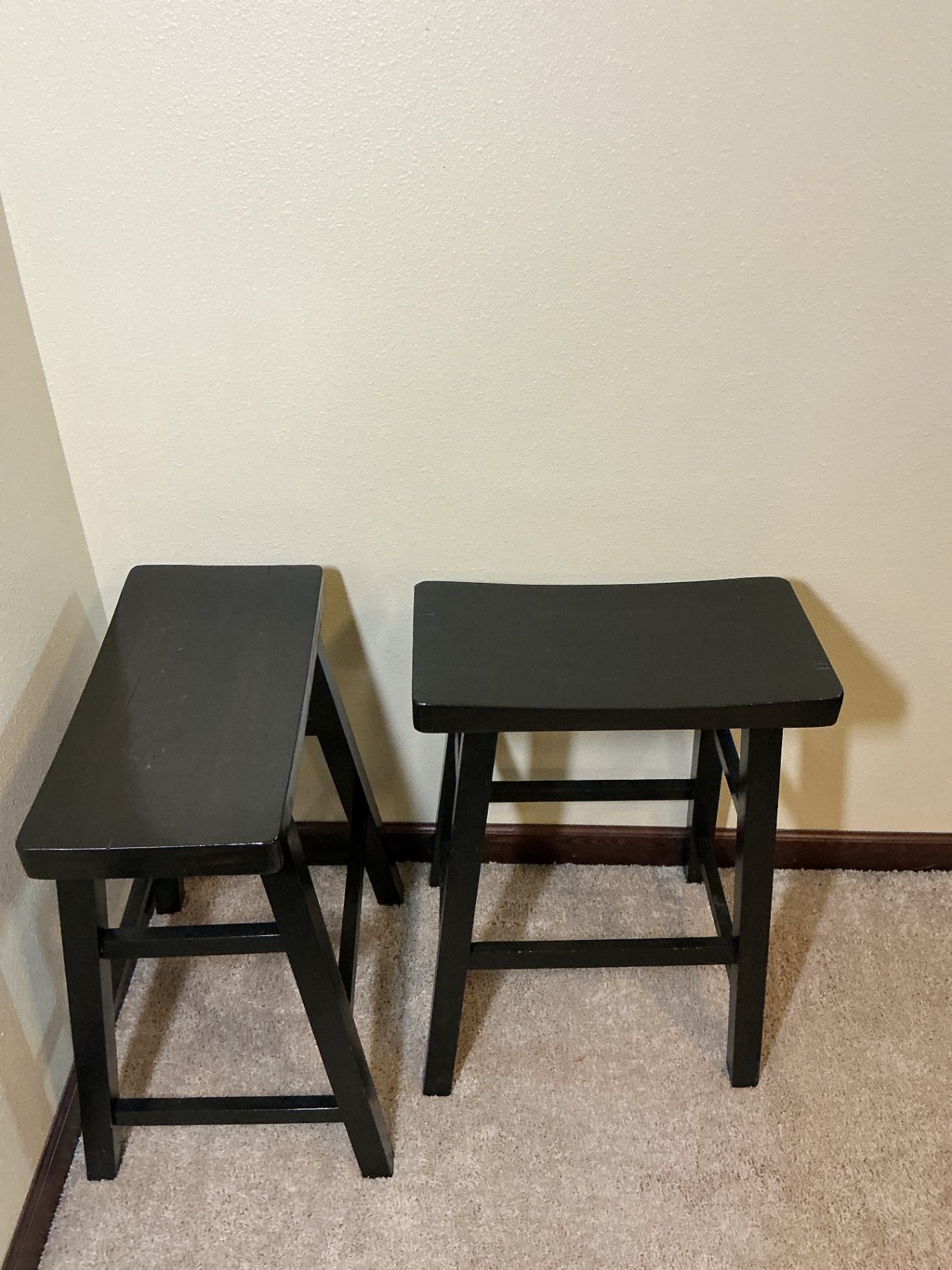 Pair of black wooden stools - image 1 of 3