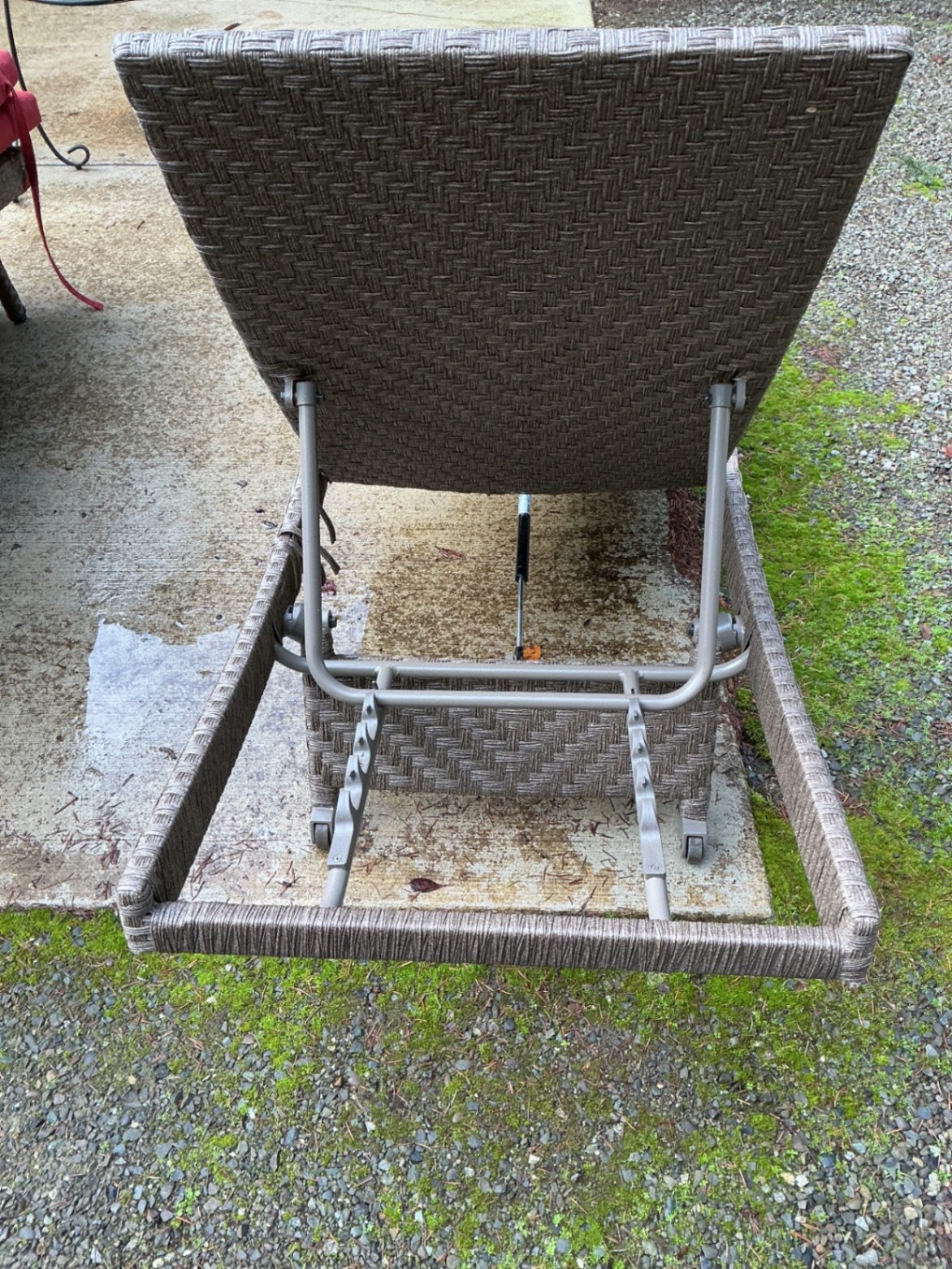 Outdoor wicker chaise lounges with red cushions and mosaic-topped table - image 4 of 6